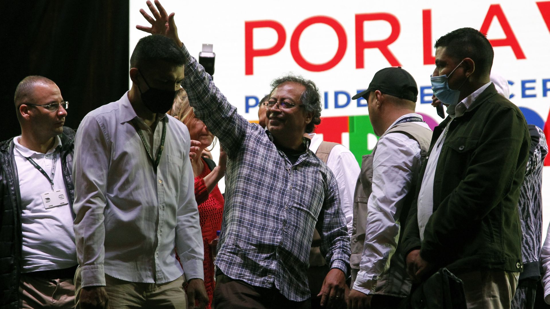 Colombian presidential candidate Gustavo Petro waves to a crowd