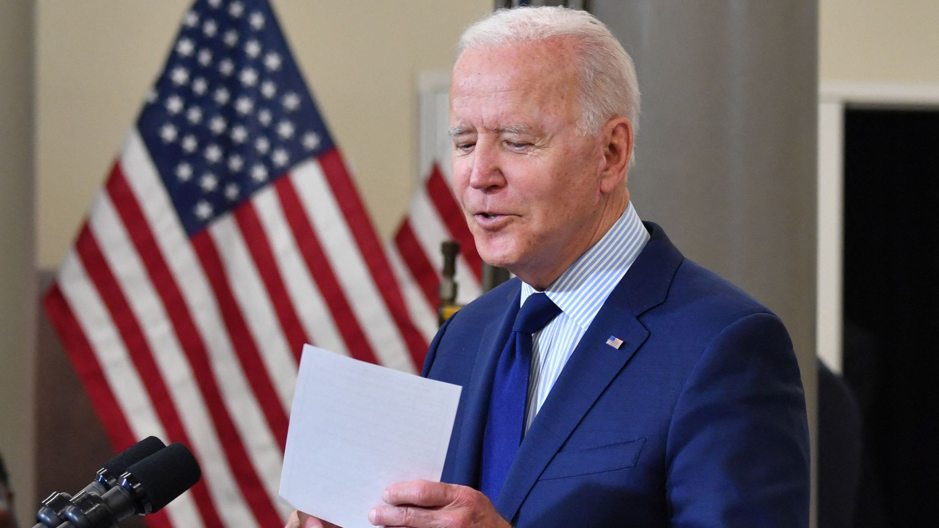 President Biden is seen holding a list of Republicans who voted against his COVID-19 stimulus law but tout its benefits back home.