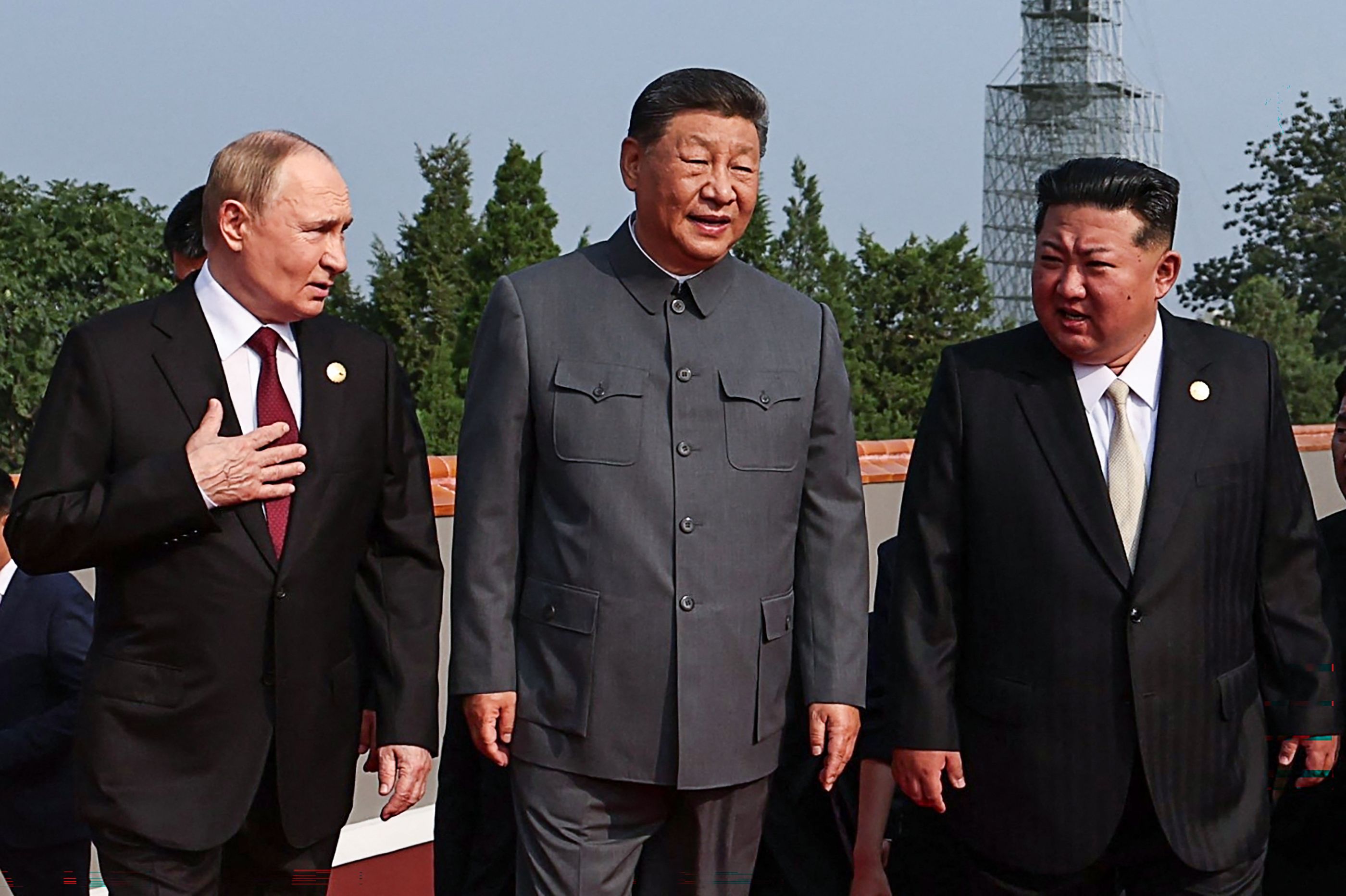 Russia's Vladimir Putin, China's Xi Jinping and North Korea's Kim Jong-un arrive at a military parade to commemorate the 80th anniversary of Japan's World War II surrender held in front of Tiananmen Gate in Beijing. 