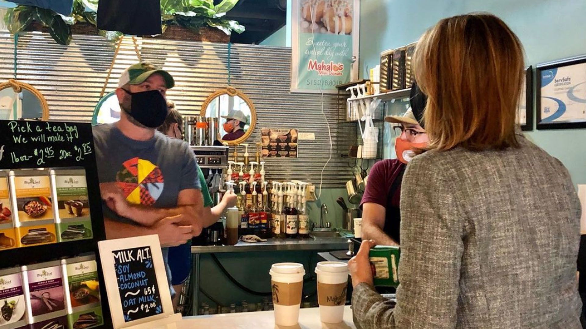 Rep. Cindy Axne visits Mahalo's Coffee and Mini Donuts in West Des Moines.