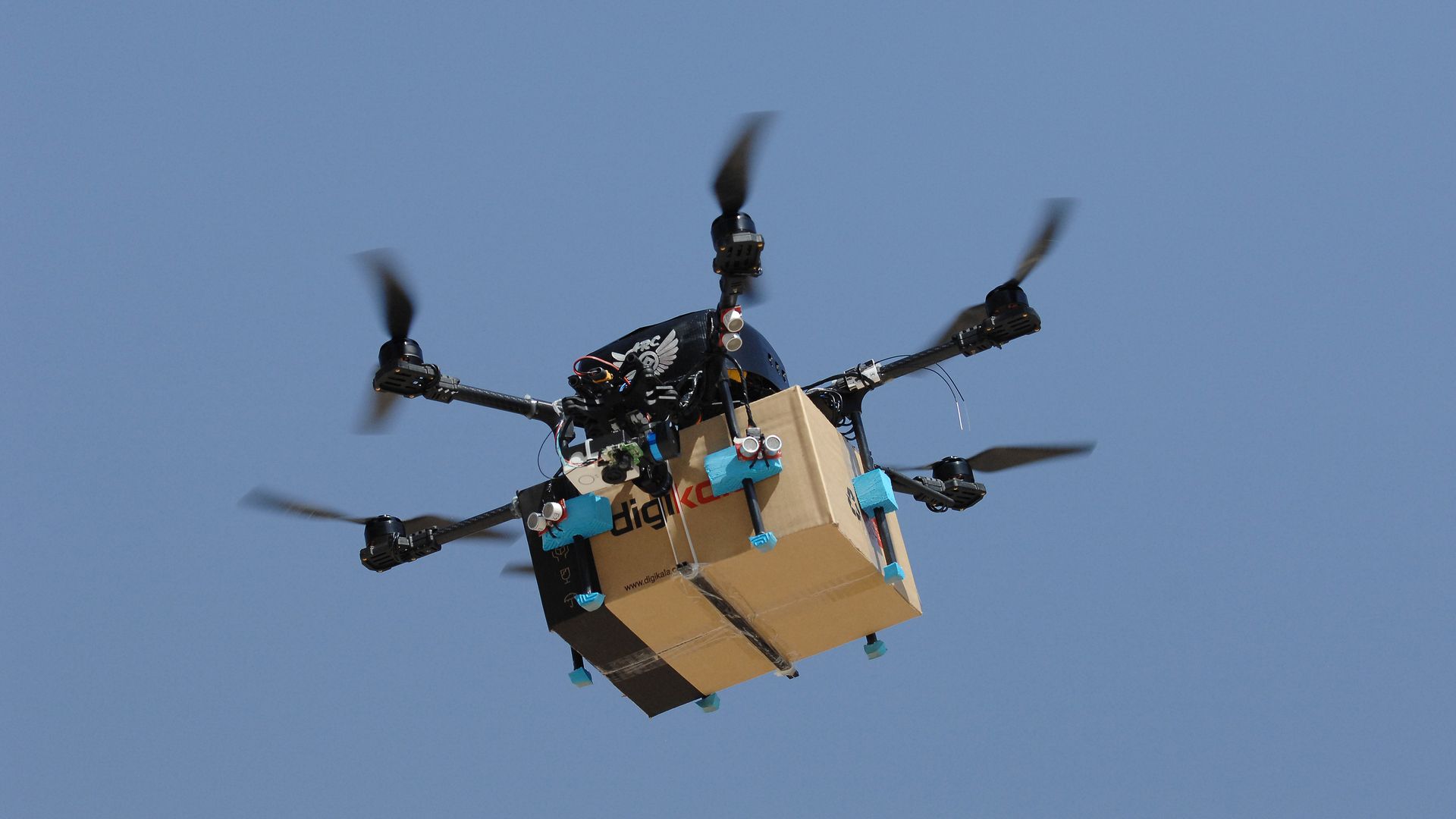 Drone carrying a package