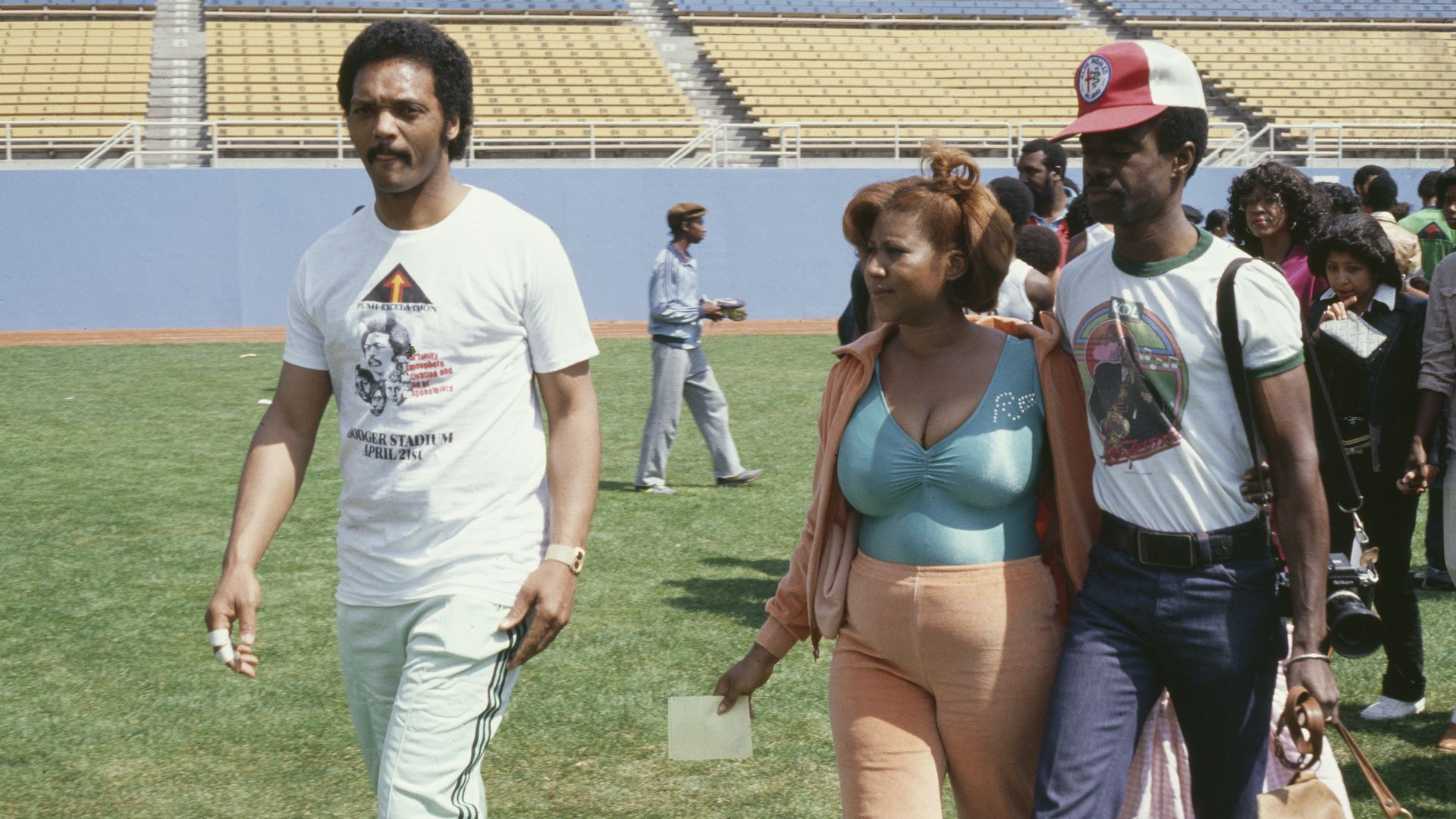 Aretha Franklin, her husband Glynn Turman and Jesse Jackson at Dodger Stadium in 1979