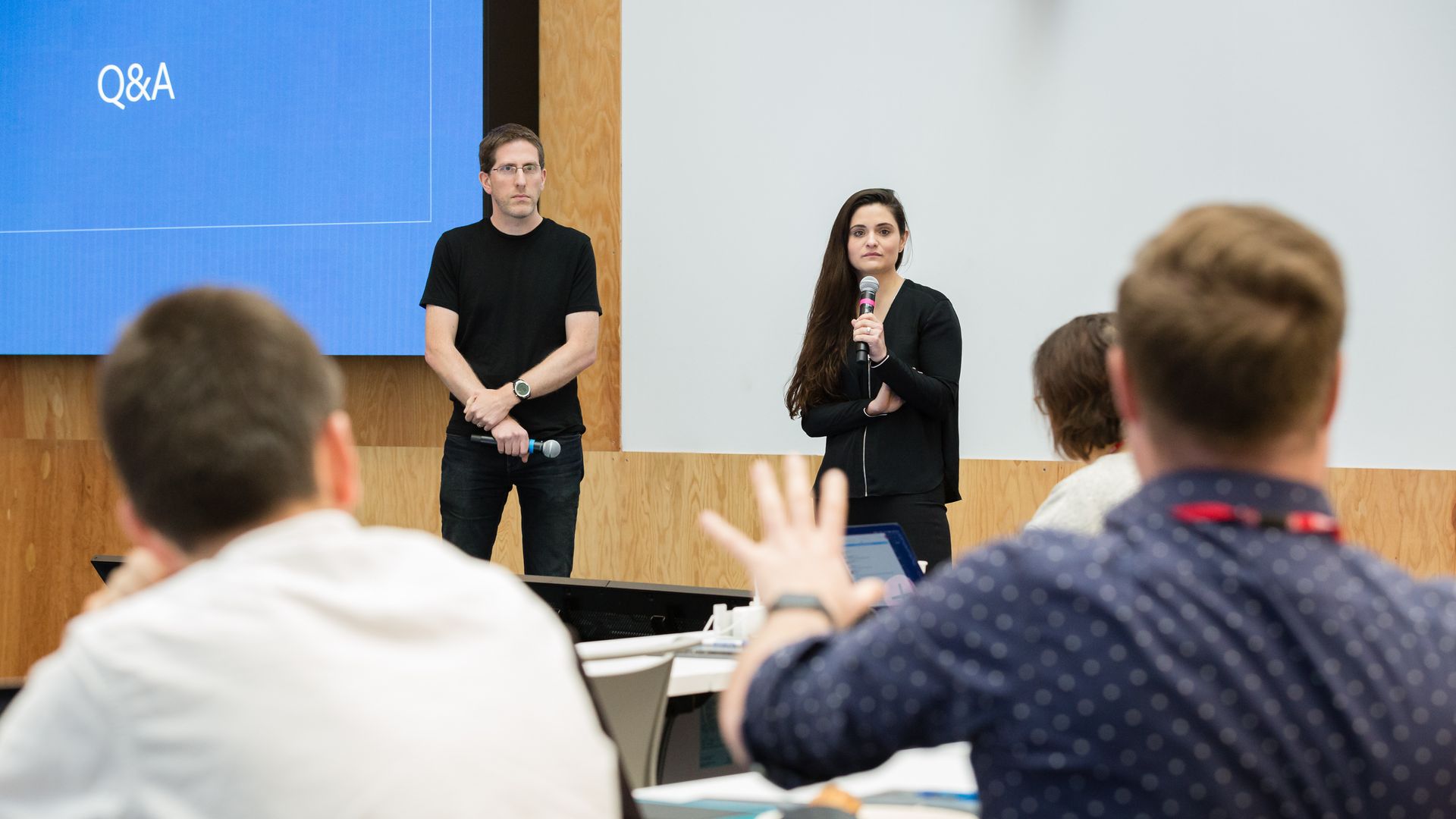 Facebook's Guy Rosen and Tessa Lyons answer reporters' questions during a presentation on efforts to fight misinformation.