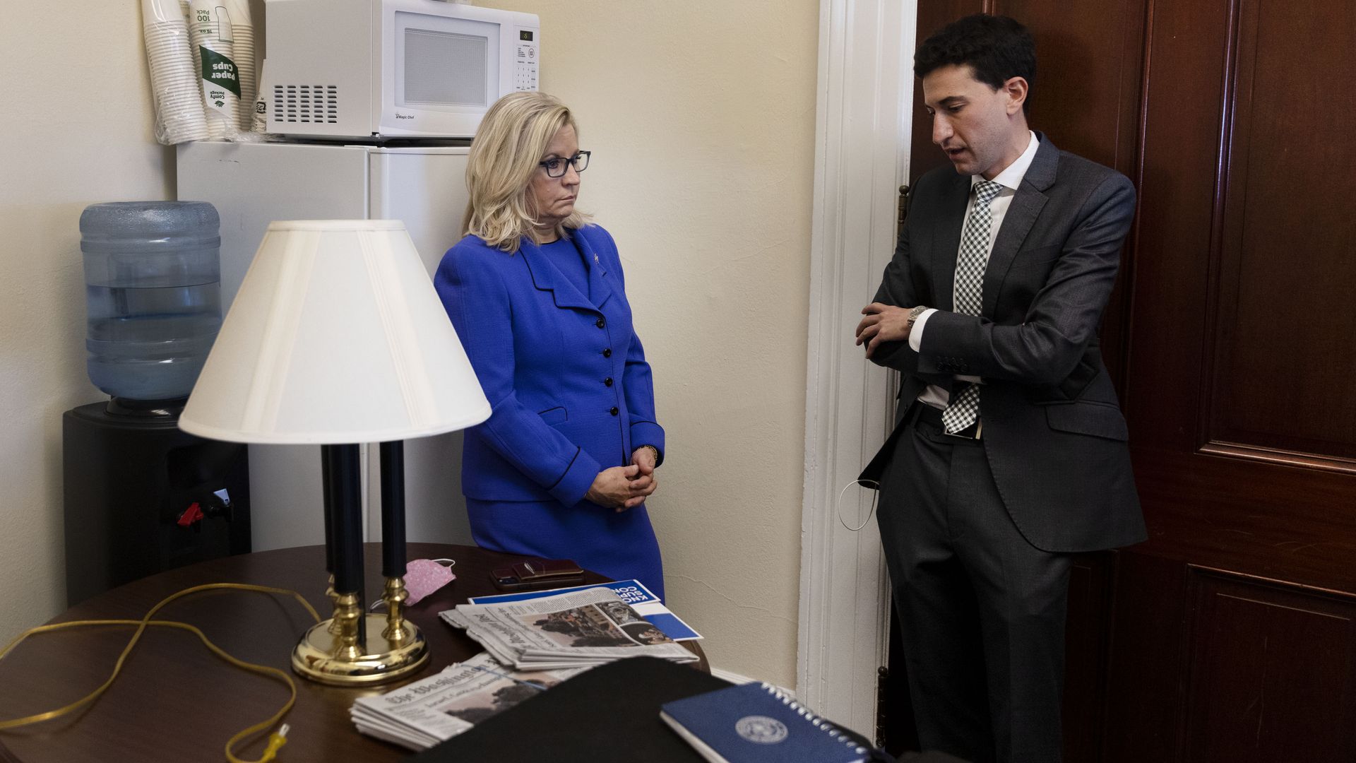 Congresswoman Liz Cheney in her office in the Cannon Building talks to her communications director Jeremy Adler