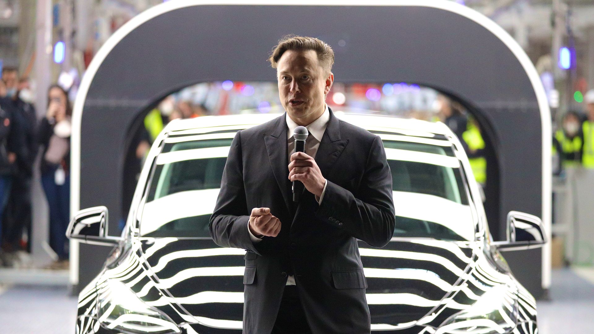 Tesla CEO Elon Musk speaks during the official opening of the new Tesla electric car manufacturing plant on March 22, 2022 near Gruenheide, Germany. 