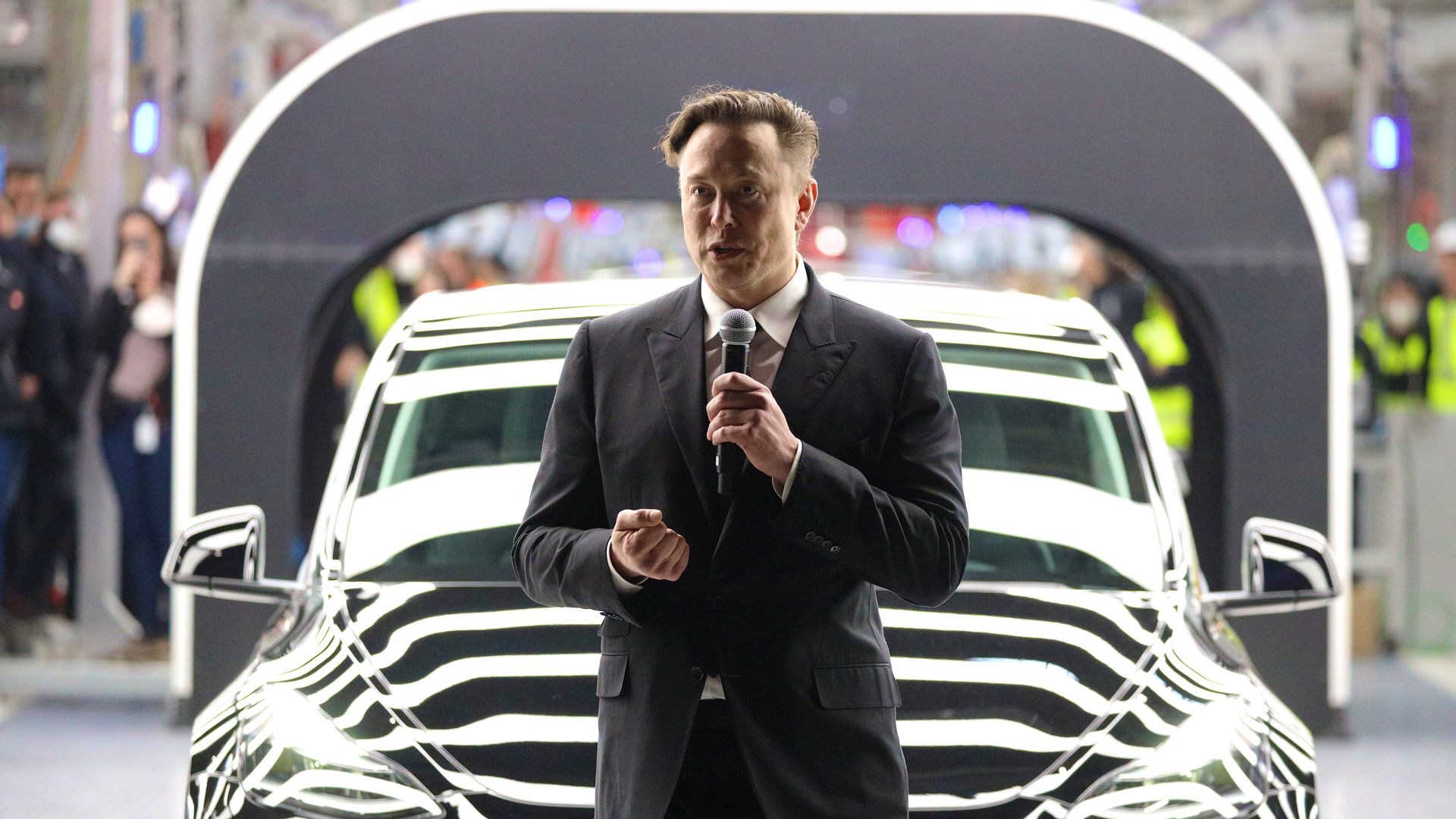 Tesla CEO Elon Musk speaks during the official opening of the new Tesla electric car manufacturing plant on March 22, 2022 near Gruenheide, Germany.