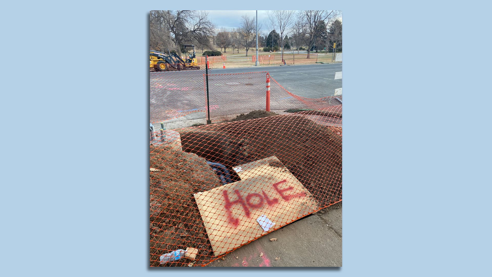 A sign that says "hole" on a construction site in Denver. 
