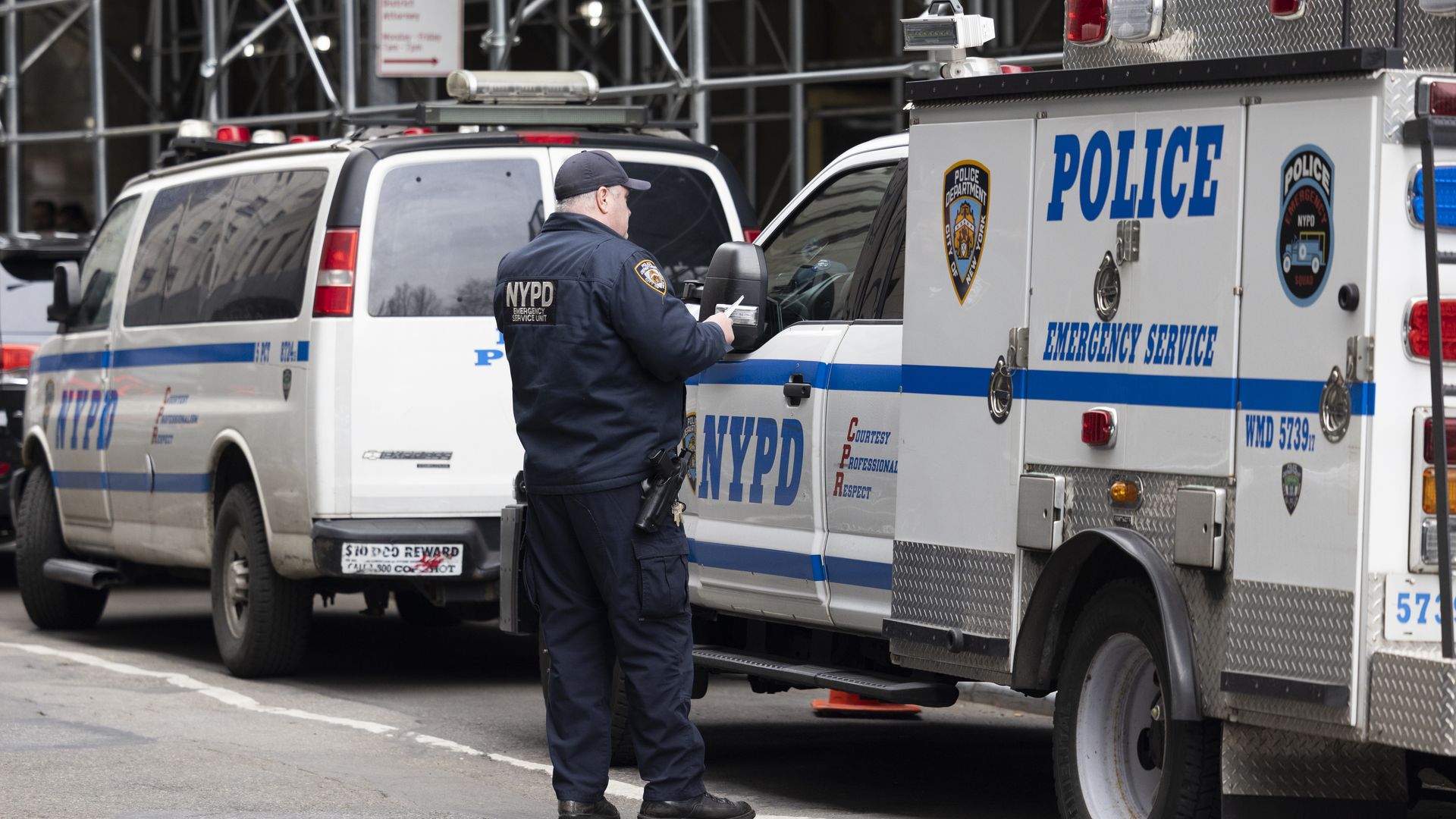 A New York Police Department (NYPD) Emergency Service unit officer outside the office of Manhattan District Attorney Alvin Bragg 