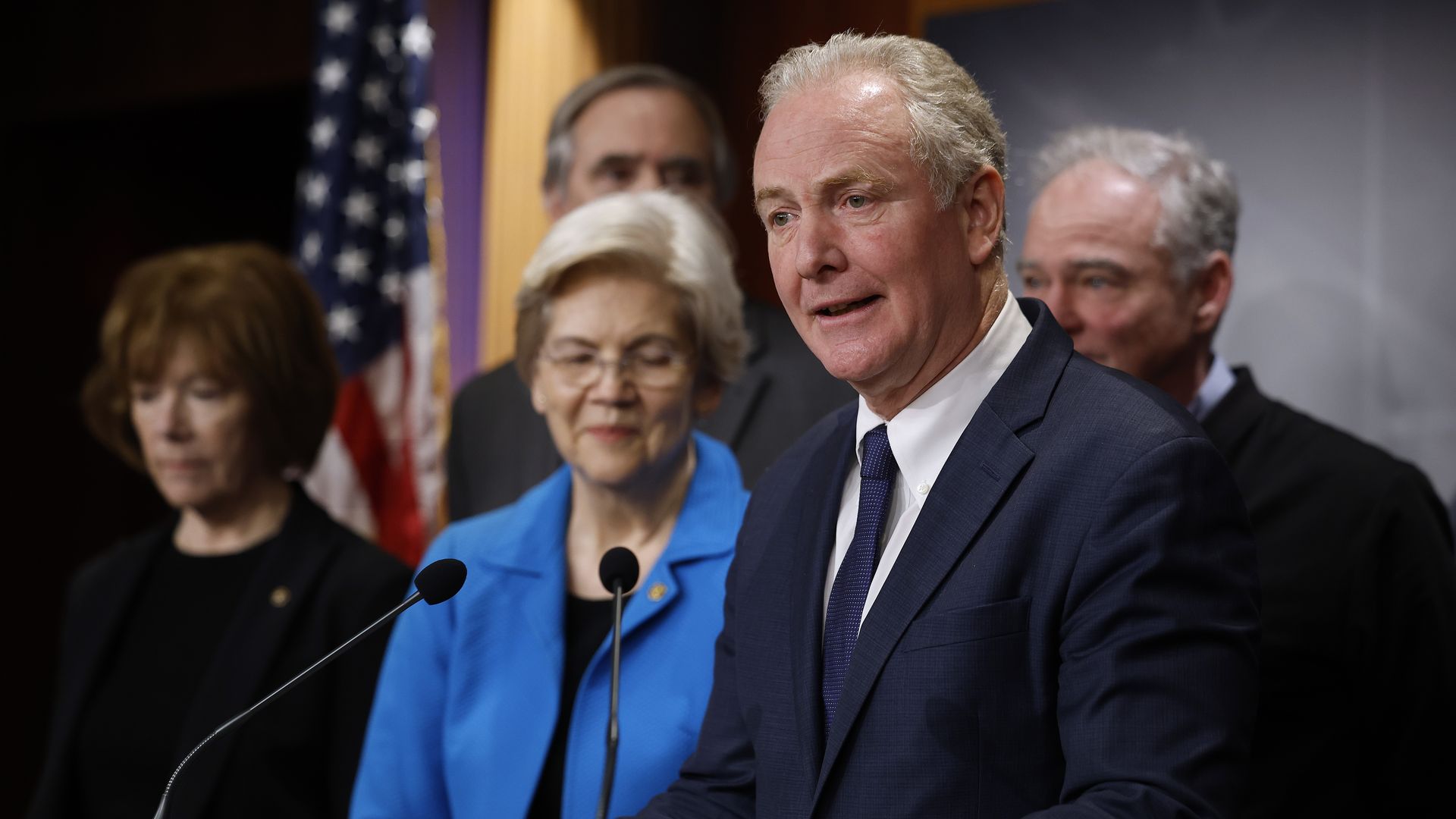 Senator Chris Van Hollen joined with fellow lawmakers in front of a podium