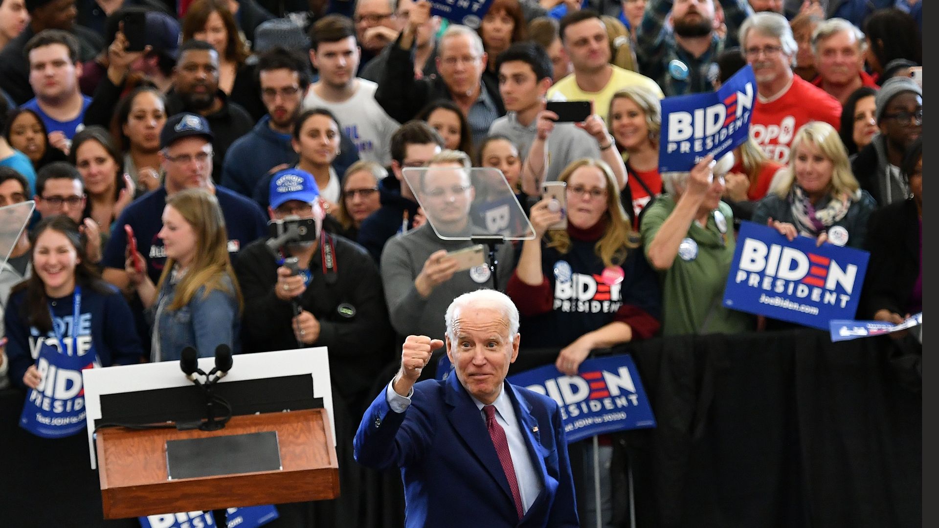  Former Vice President Joe Biden gestures during a campaign rally at Renaissance High School in Detroit, Michigan on March 9, 2020.