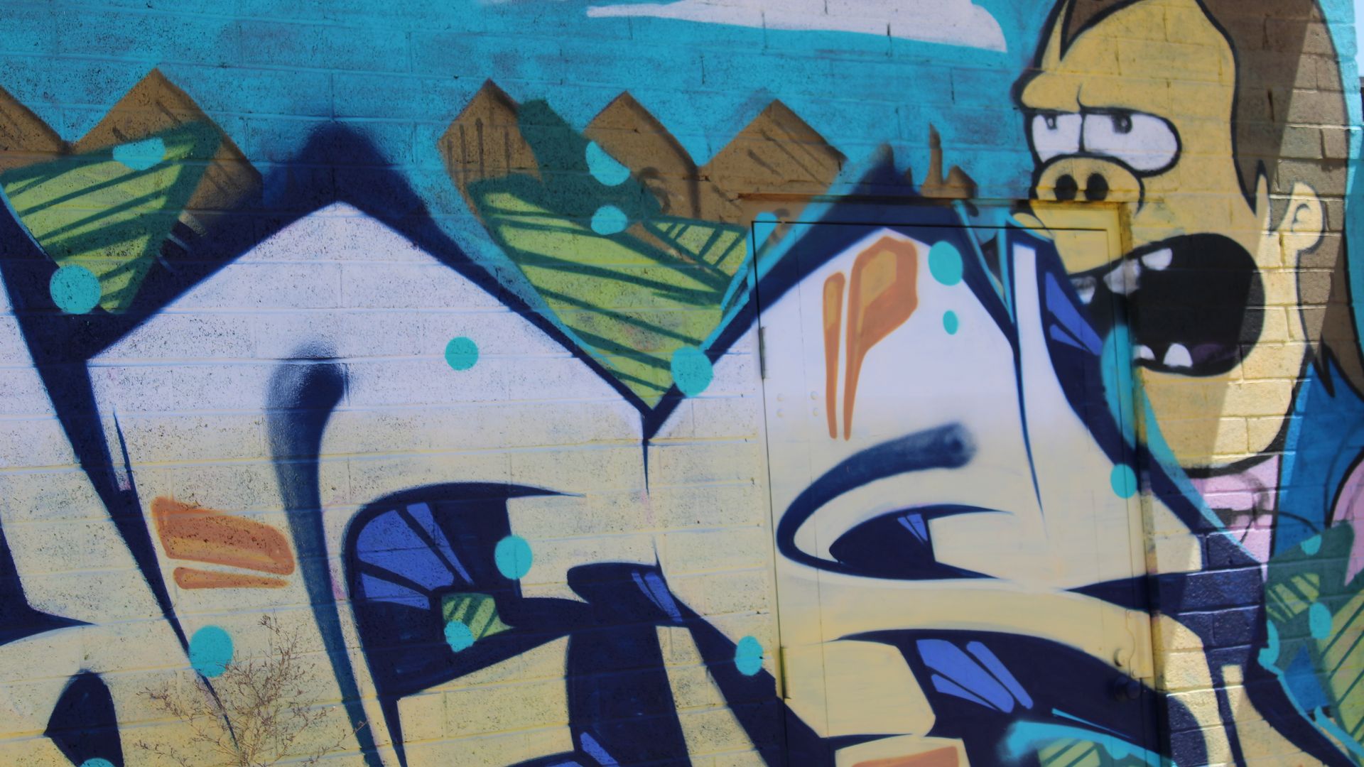 A portion of a mural featuring the character Nelson Muntz from the animated television show the Simpsons