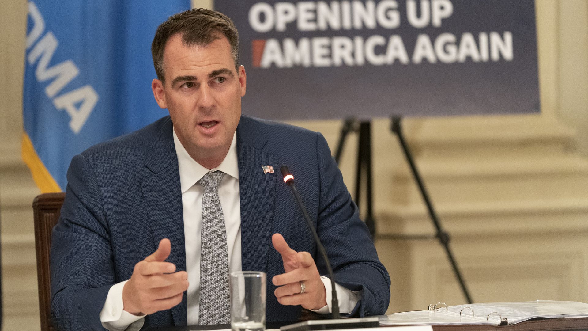Kevin Stitt, governor of Oklahoma, speaks during a meeting with former U.S. President Donald Trump.