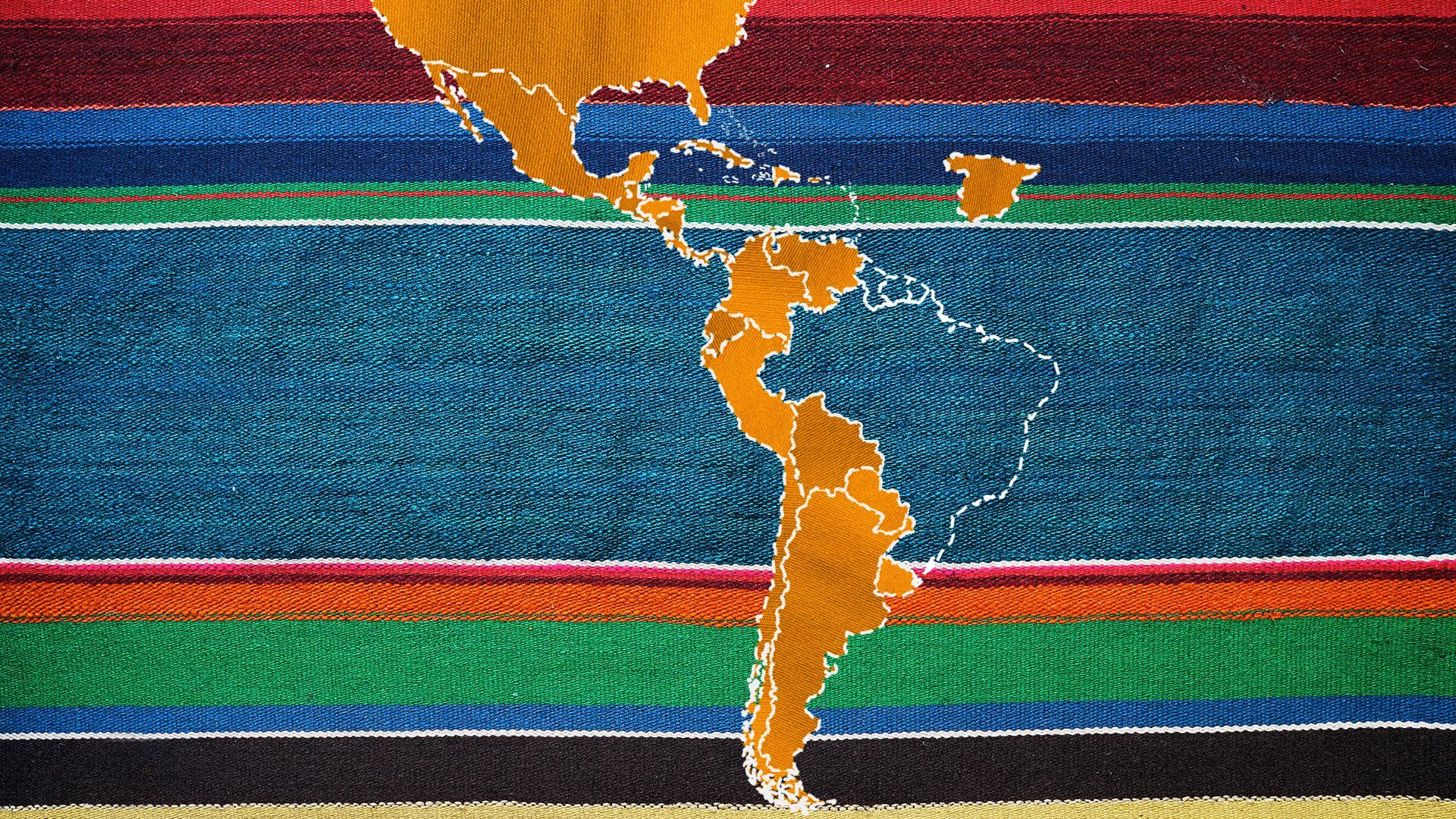 Illustration of a map of Hispanic countries sewn onto colorful fabric.