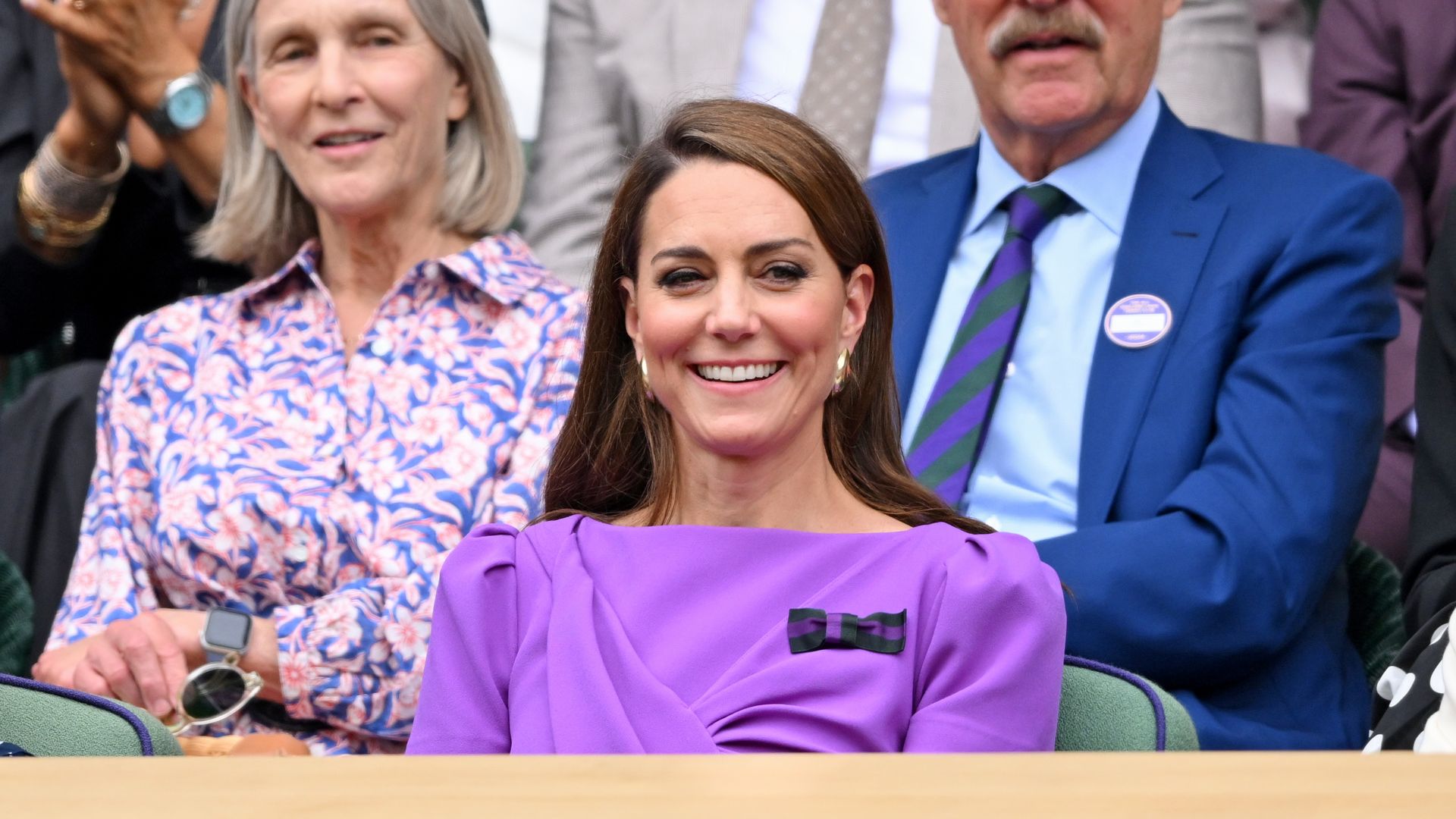Catherine Princess of Wales laughing court-side at Wimbledon.