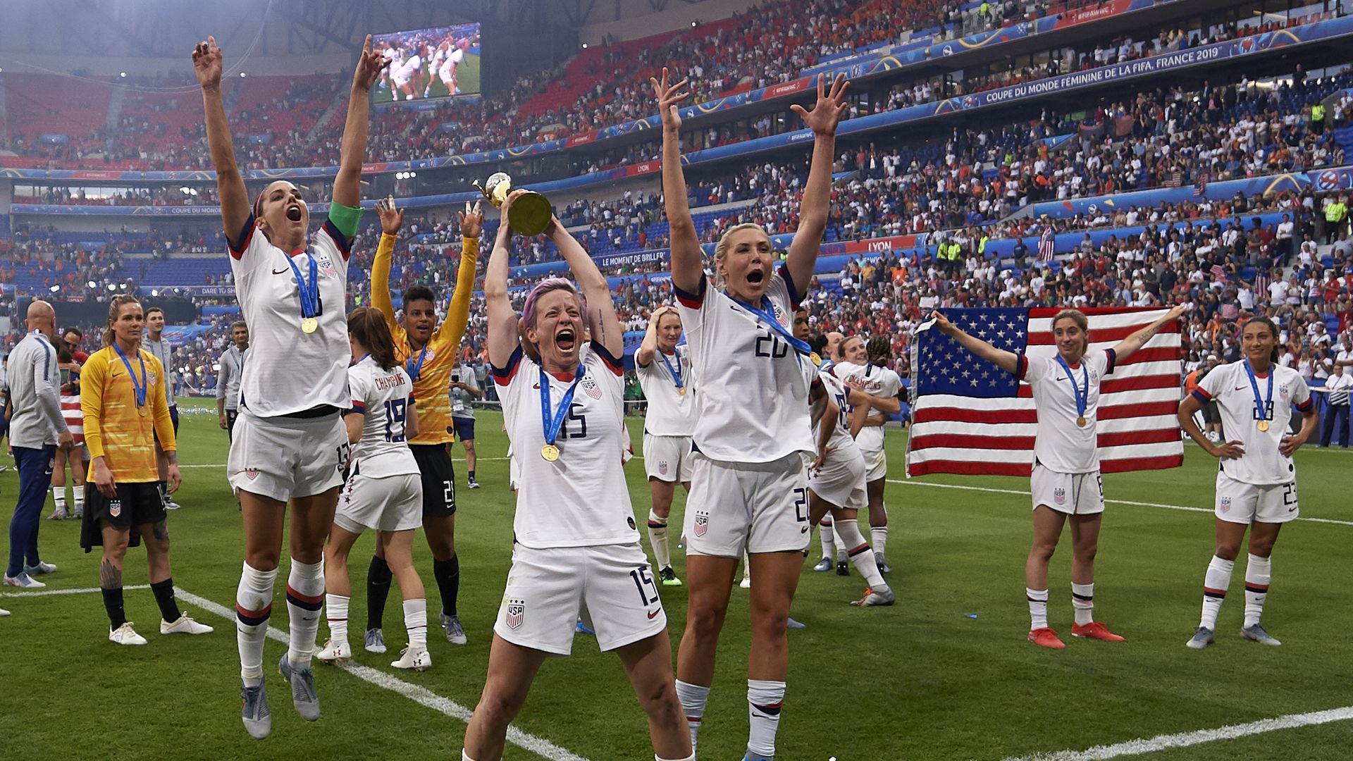Megan Rapinoe (Reign FC) and Alex Morgan (Orlando Pride) of United States celebrate whit her teammates after winning the 2019 FIFA Women's World Cup France Final match 