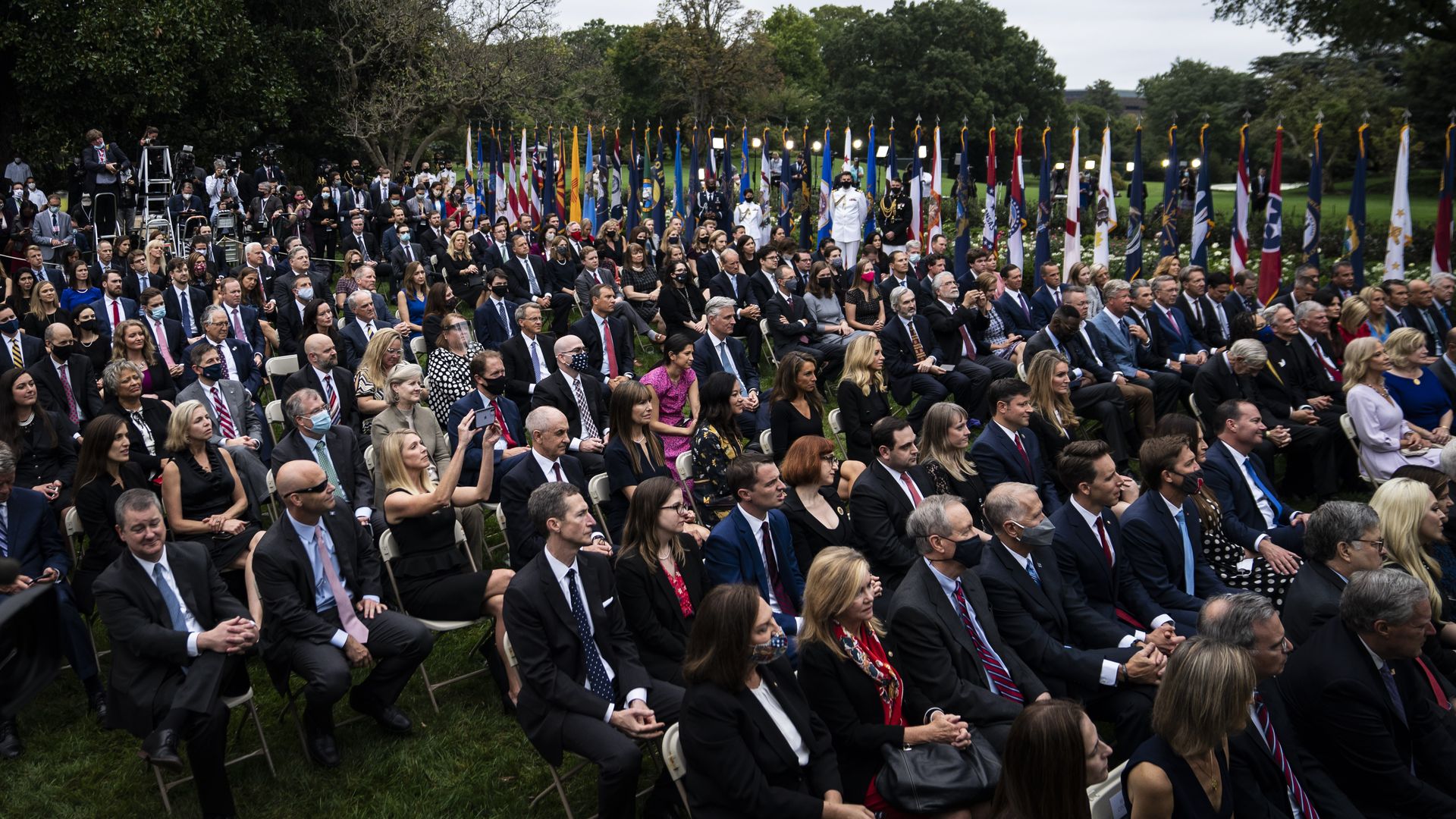 taff and visitors listen as President Donald J. Trump speaks with Judge Amy Coney Barrett during a ceremony to announce Barrett as his nominee to the Supreme Court in the Rose Garden