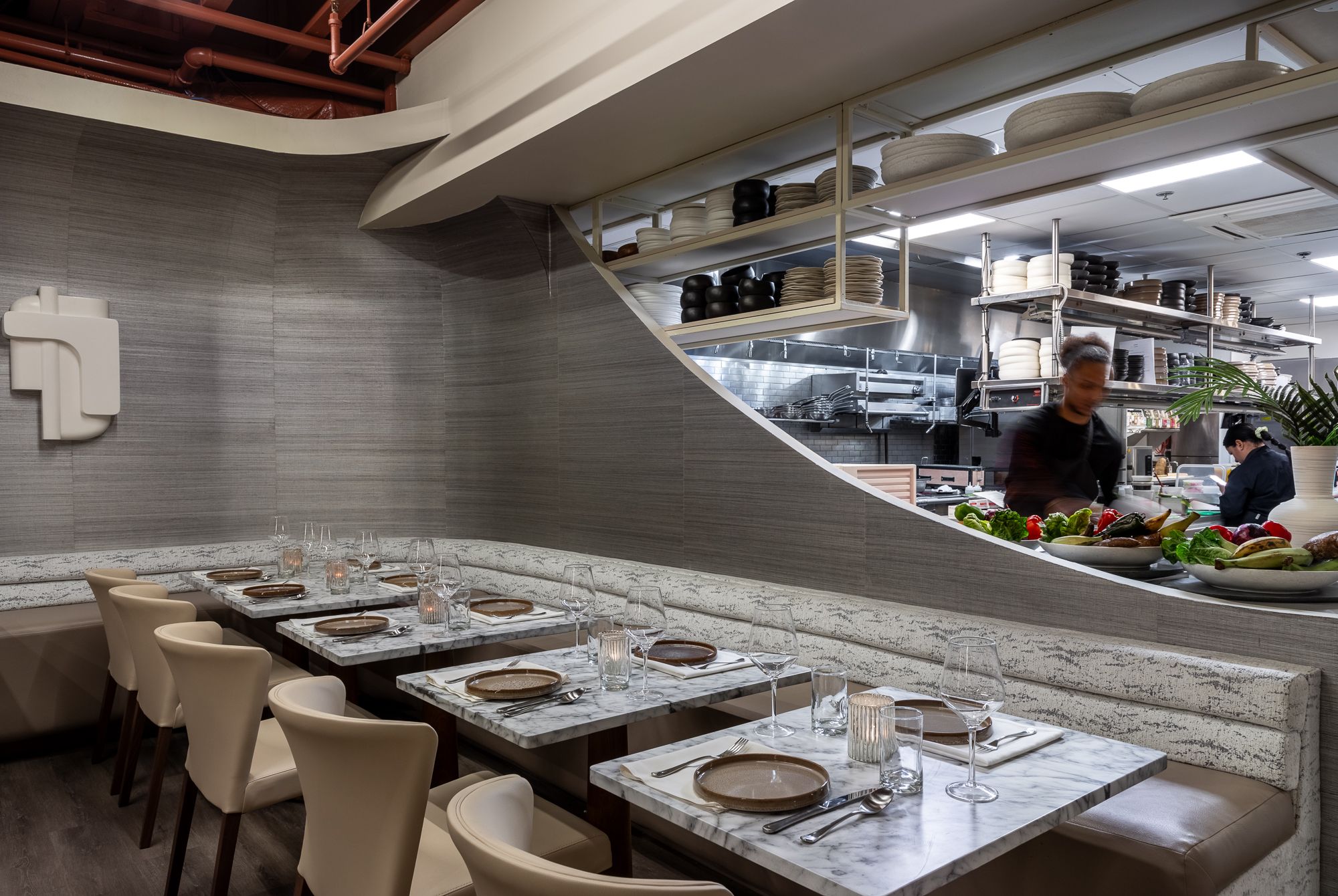 Seats overlooking the kitchen