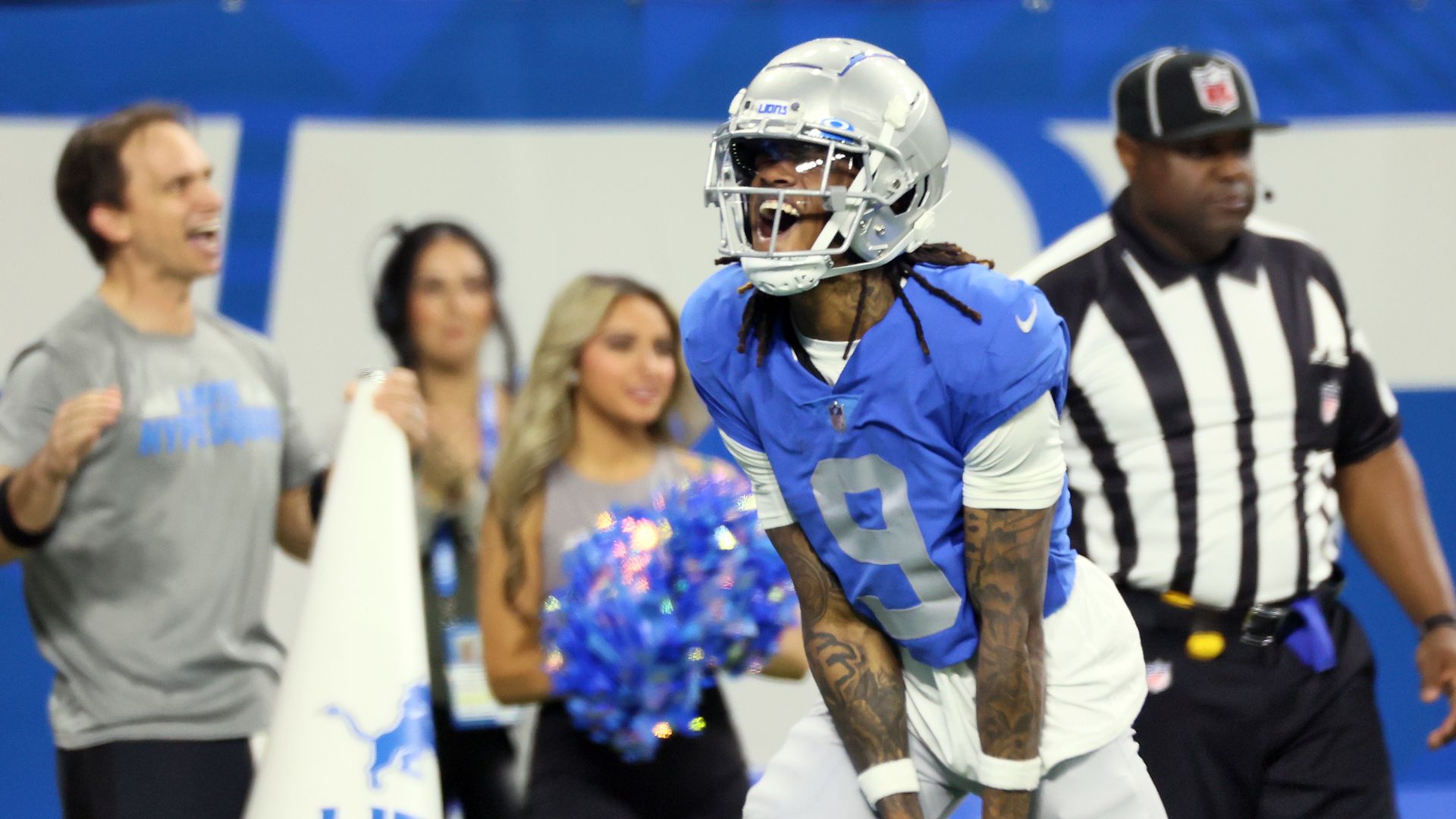 Wide receiver Jameson Williams celebrates against the Bears