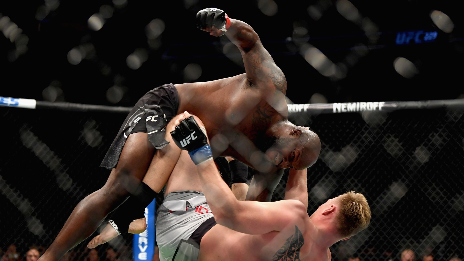 Derrick Lewis (top) beats on Alexander Volkov of Russia to a knock out on Oct. 6. Photo: Harry How/Getty Images