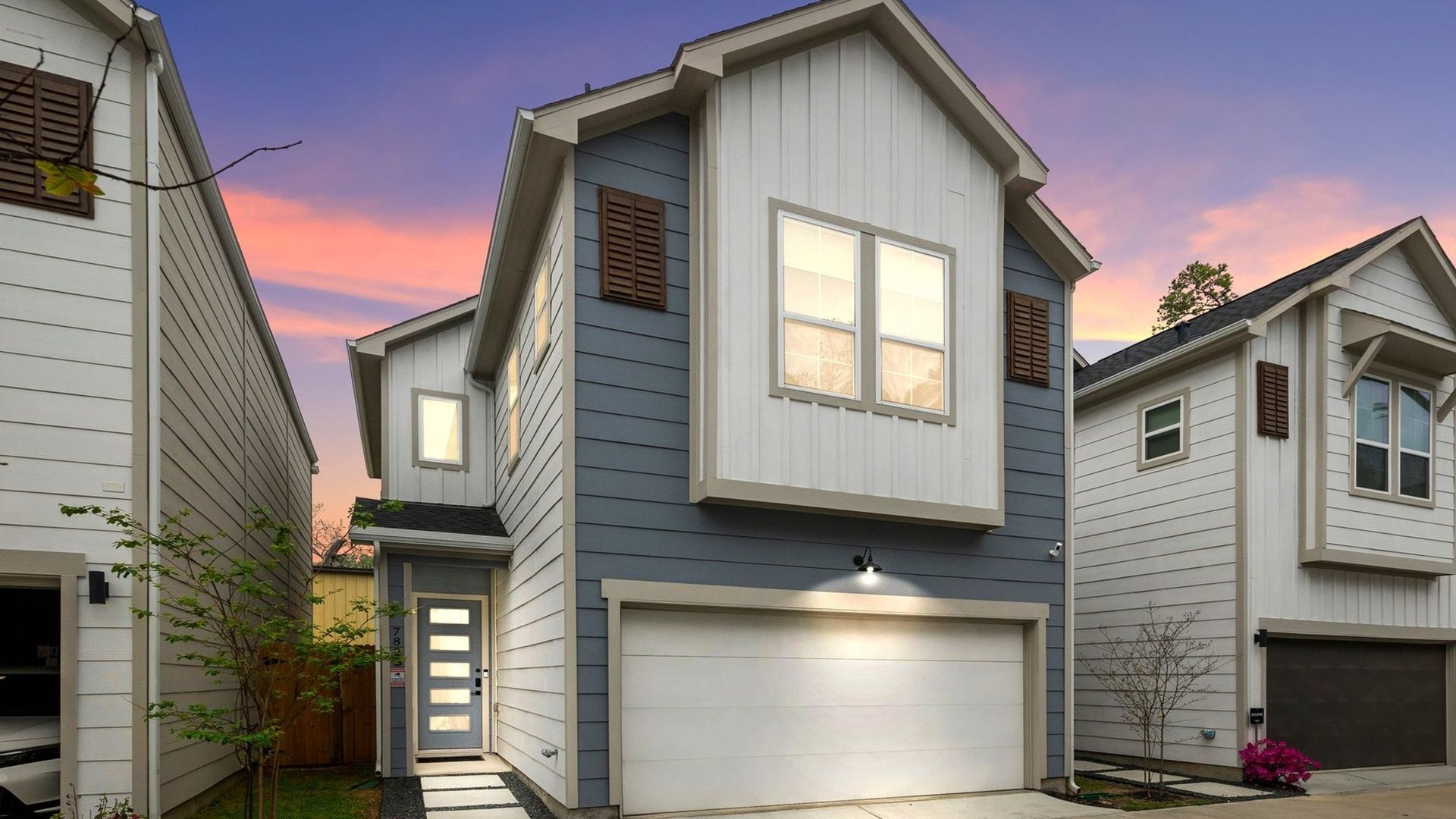 new build townhome at sunset