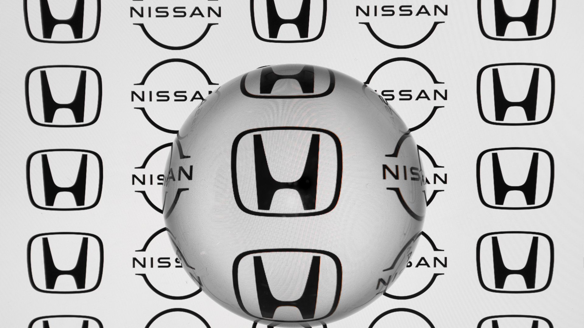 Honda and Nissan logos with a magnifying glass image over them.