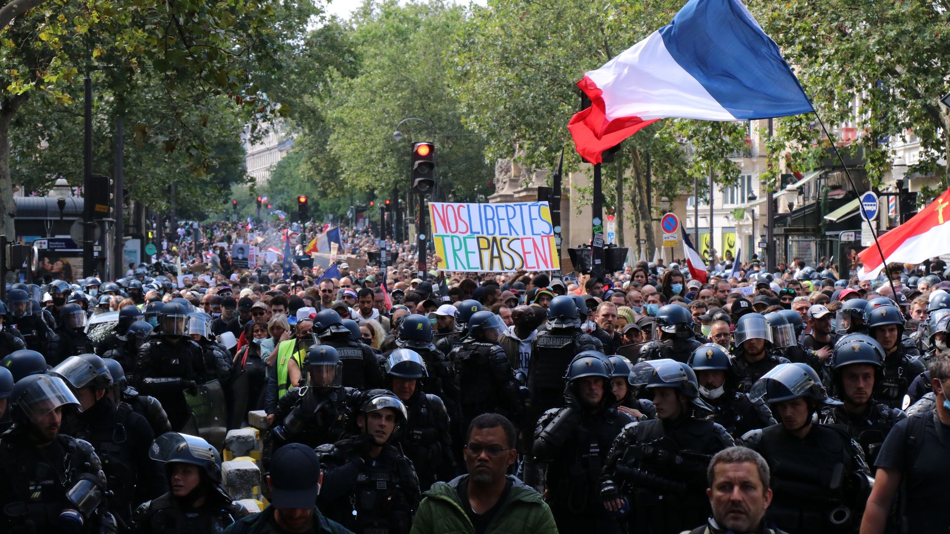 People continue their protests for the fourth week in a row after the highest constitutional authority in France ruled in favor of controversial measures for a COVID-19 "health pass".