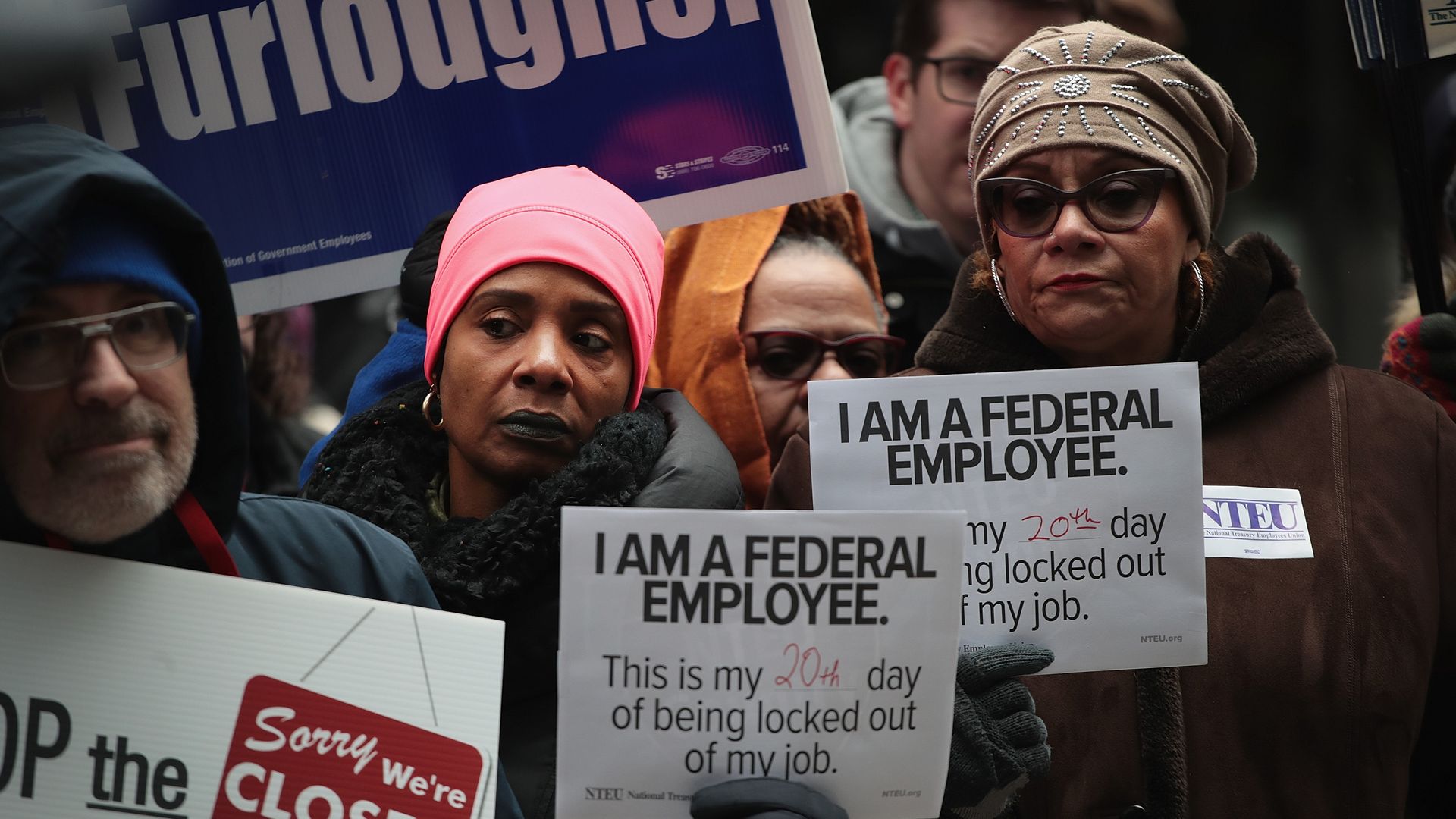 Government workers protest the government shutdown during a demonstration in the Federal Building Plaza last week in Chicago, Illinois.