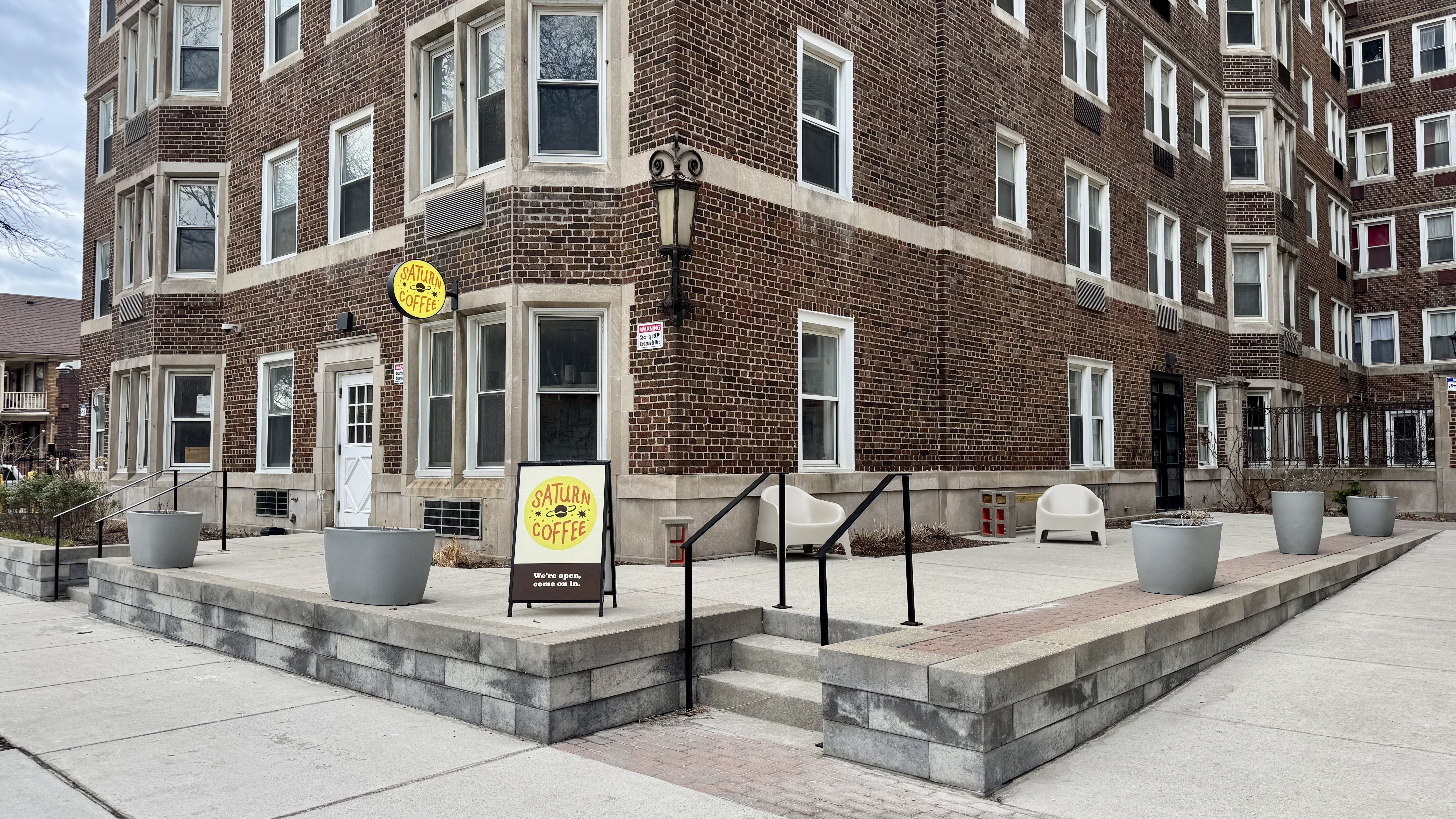 A historic building with a coffee shop in the ground floor