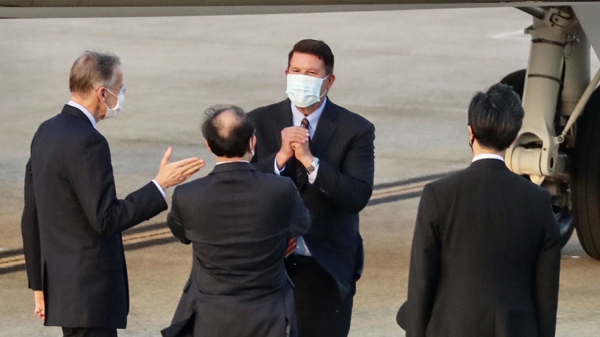 Keith Krach (top C), U.S. undersecretary of State, greeted by Taiwanese political delegates at Sungshan Arport in Taipei on Sept. 17