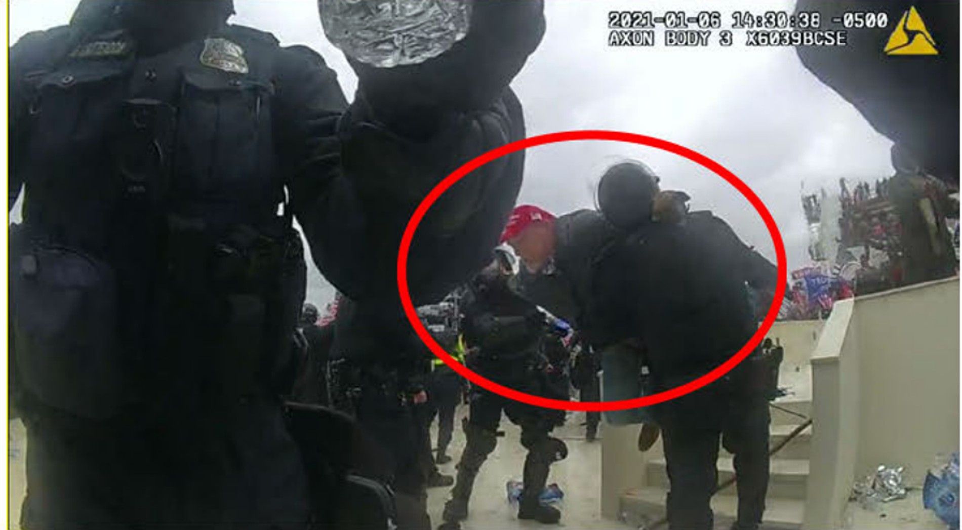 A man whom prosecutors identified as Kenneth Bonawitz is circled in red in a screen grab from a law enforcement body camera during the Jan. 6, 2021. U.S. Capitol riot. 