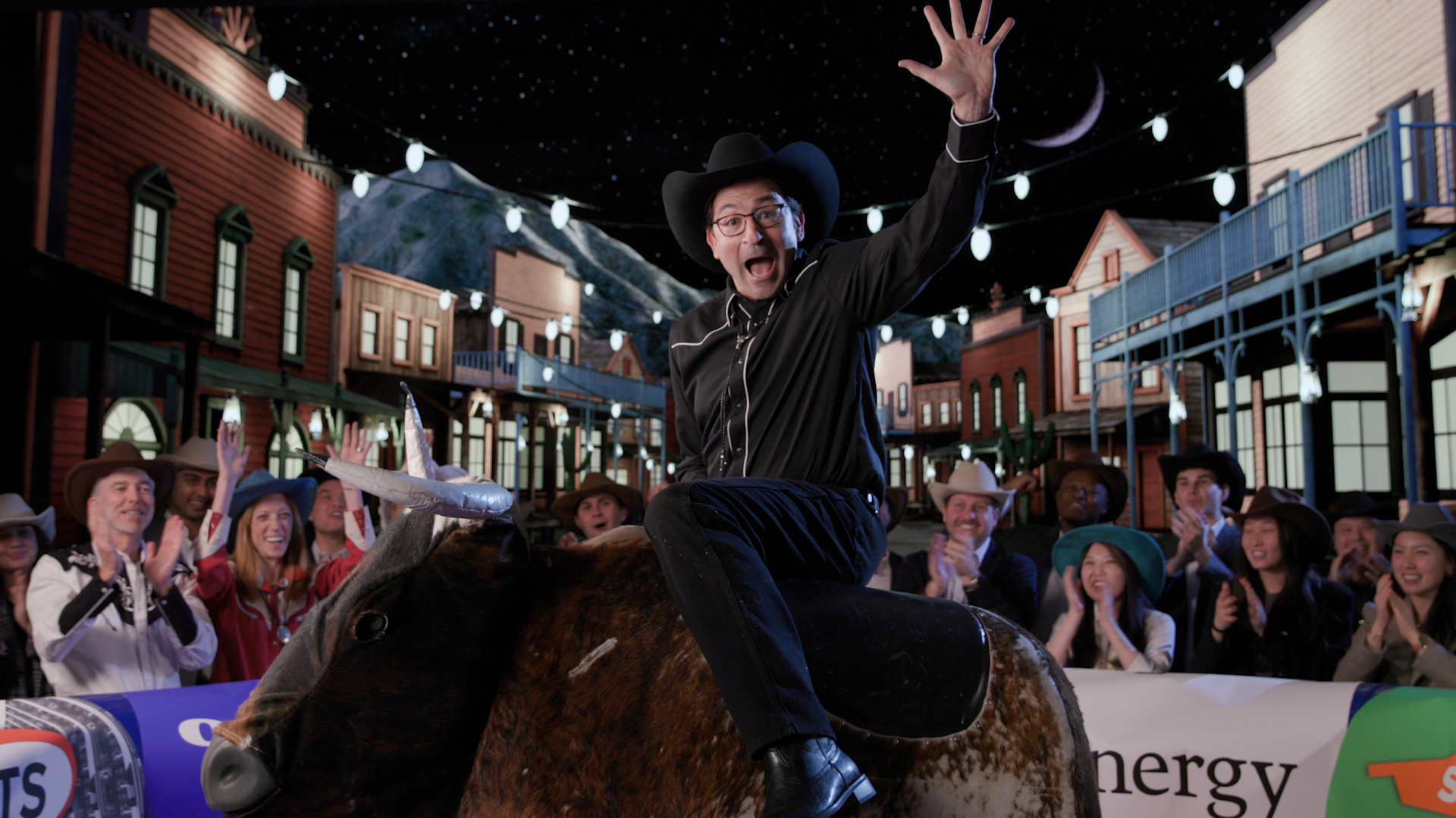 Photo of Jon Gray riding a mechanical bull