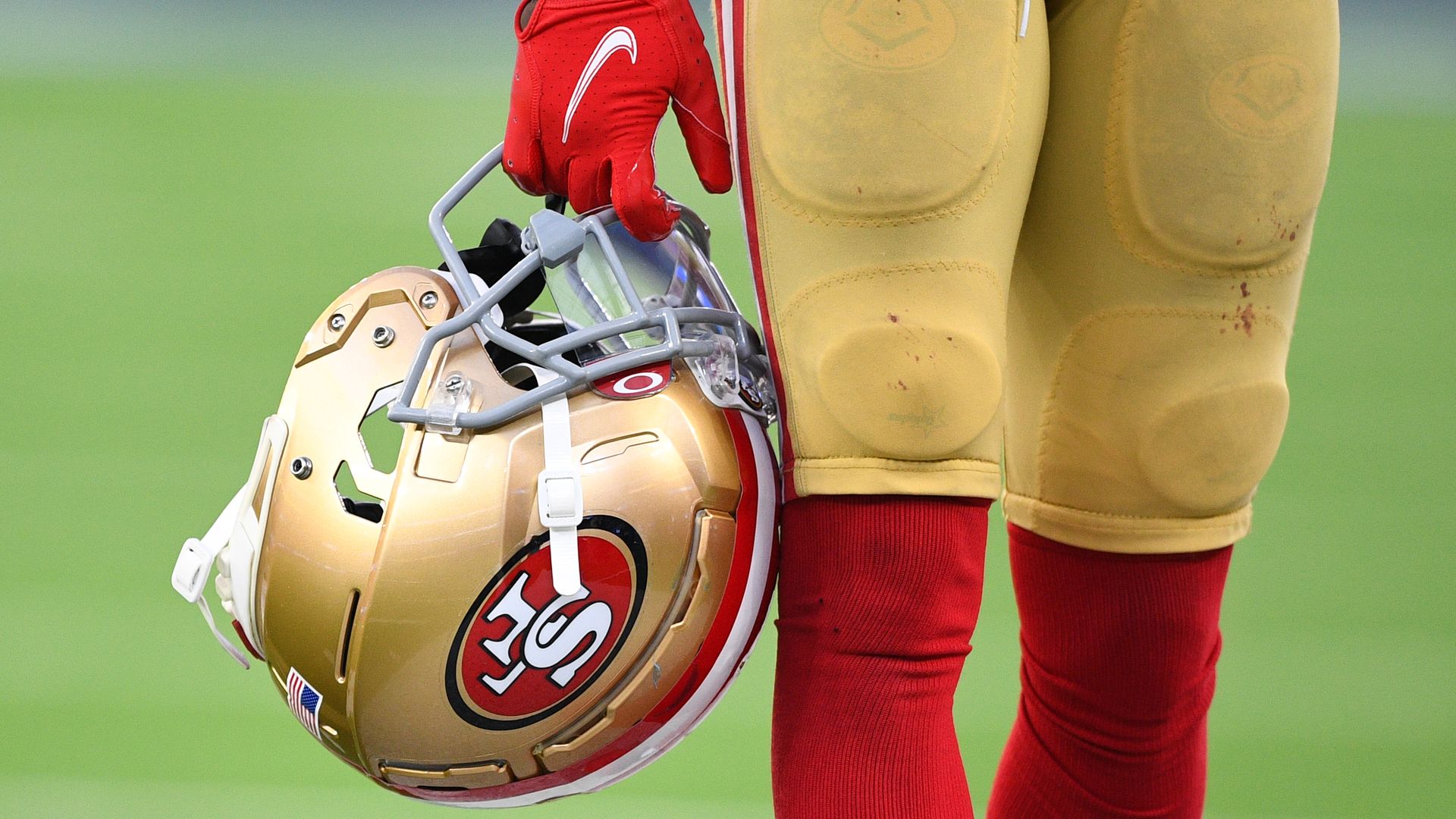 A 49ers player holds his helmet during the NFL game between the San Francisco 49ers and the Los Angeles Rams on January 9, 2022