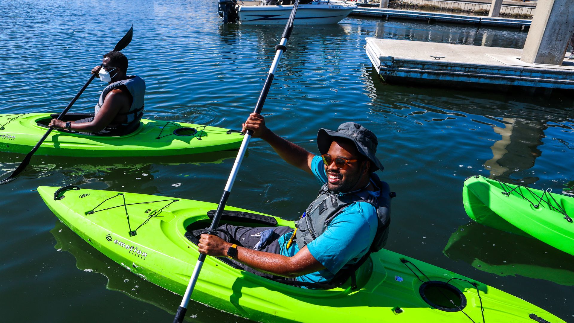 Julius Crowe Hampton, a Outdoor Afro leader, smiles as he kayaks after launching his boat from Marina Bay Yacht Harbor in Richmond, Calif.