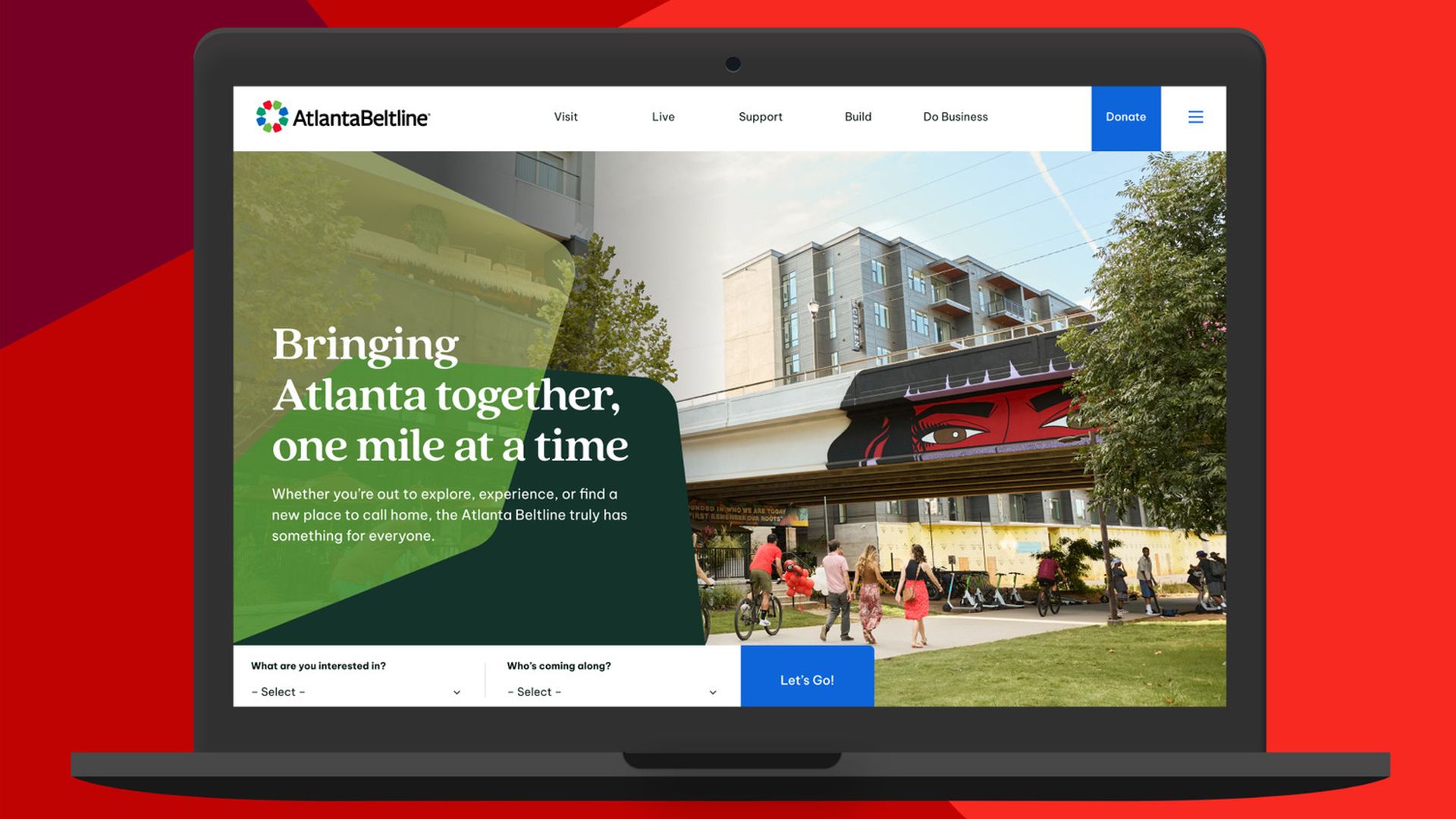 A rendering of a laptop screen open showing a website for the Beltline trails, parks and transit project