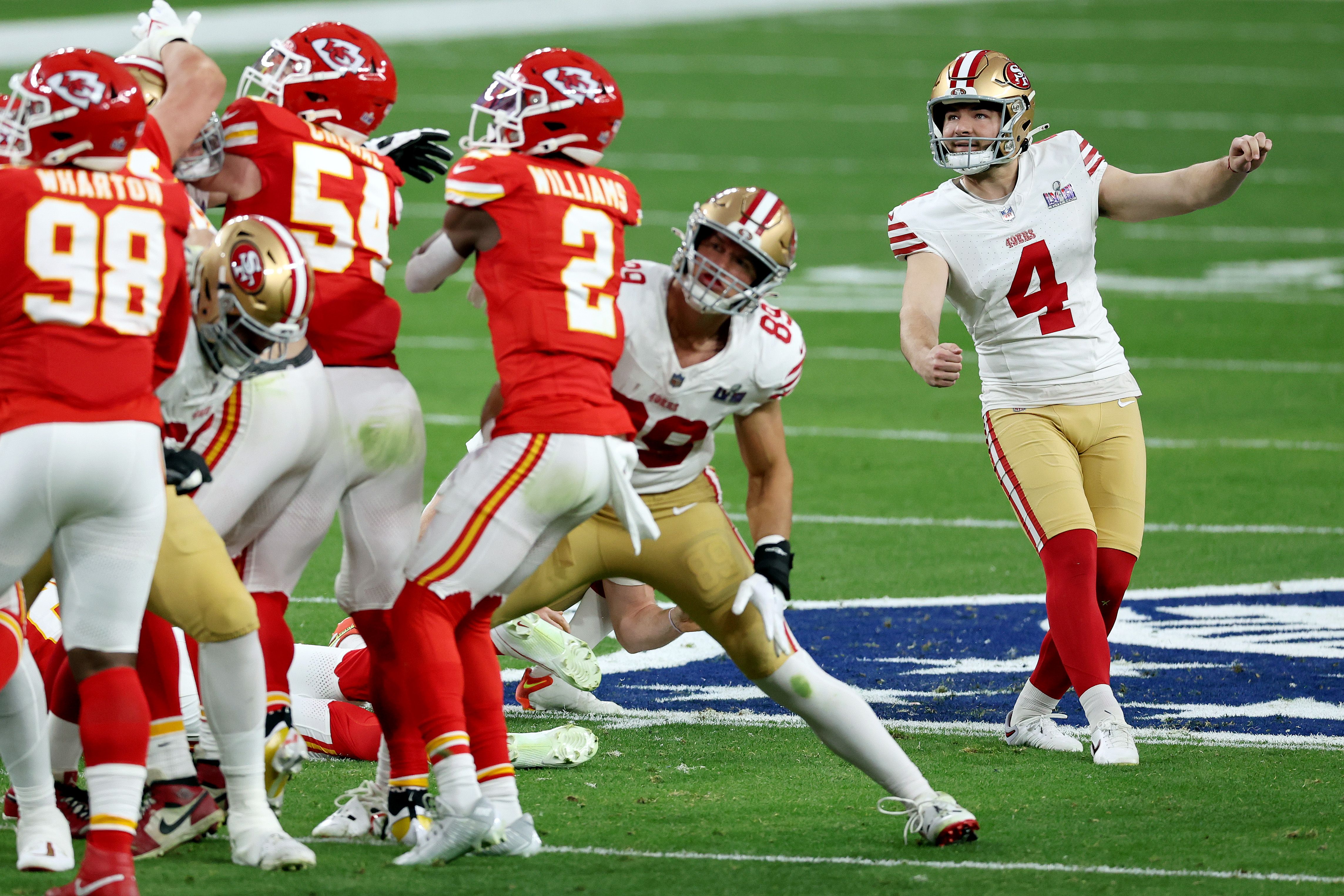  Jake Moody #4 of the San Francisco 49ers kicks a Super Bowl record setting 55-yard field goal in the first quarter during Super Bowl LVIII against the Kansas City Chiefs at Allegiant Stadium on February 11, 2024 in Las Vegas, Nevada. 