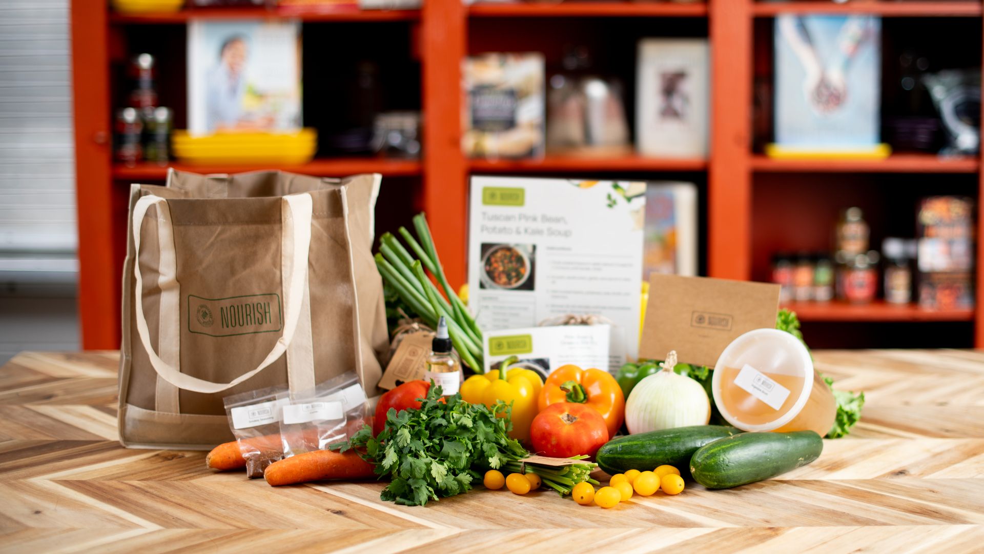 A bag of produce and other healthy cooking ingredients 