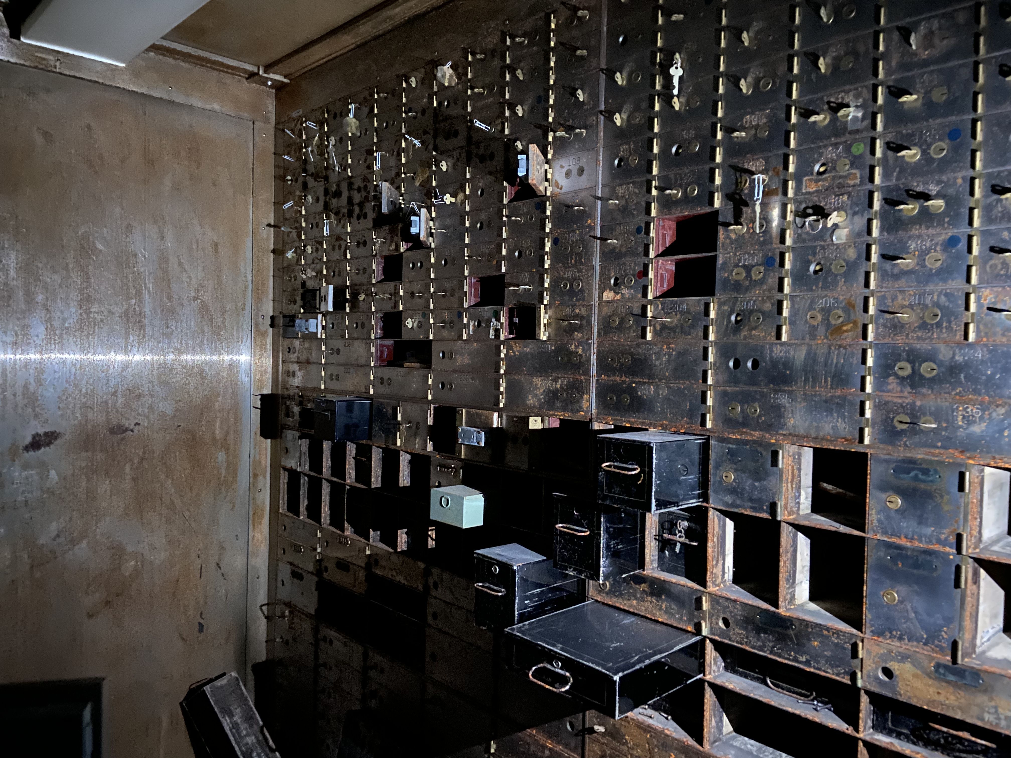 The inside of a safety-deposit vault with individual boxes open