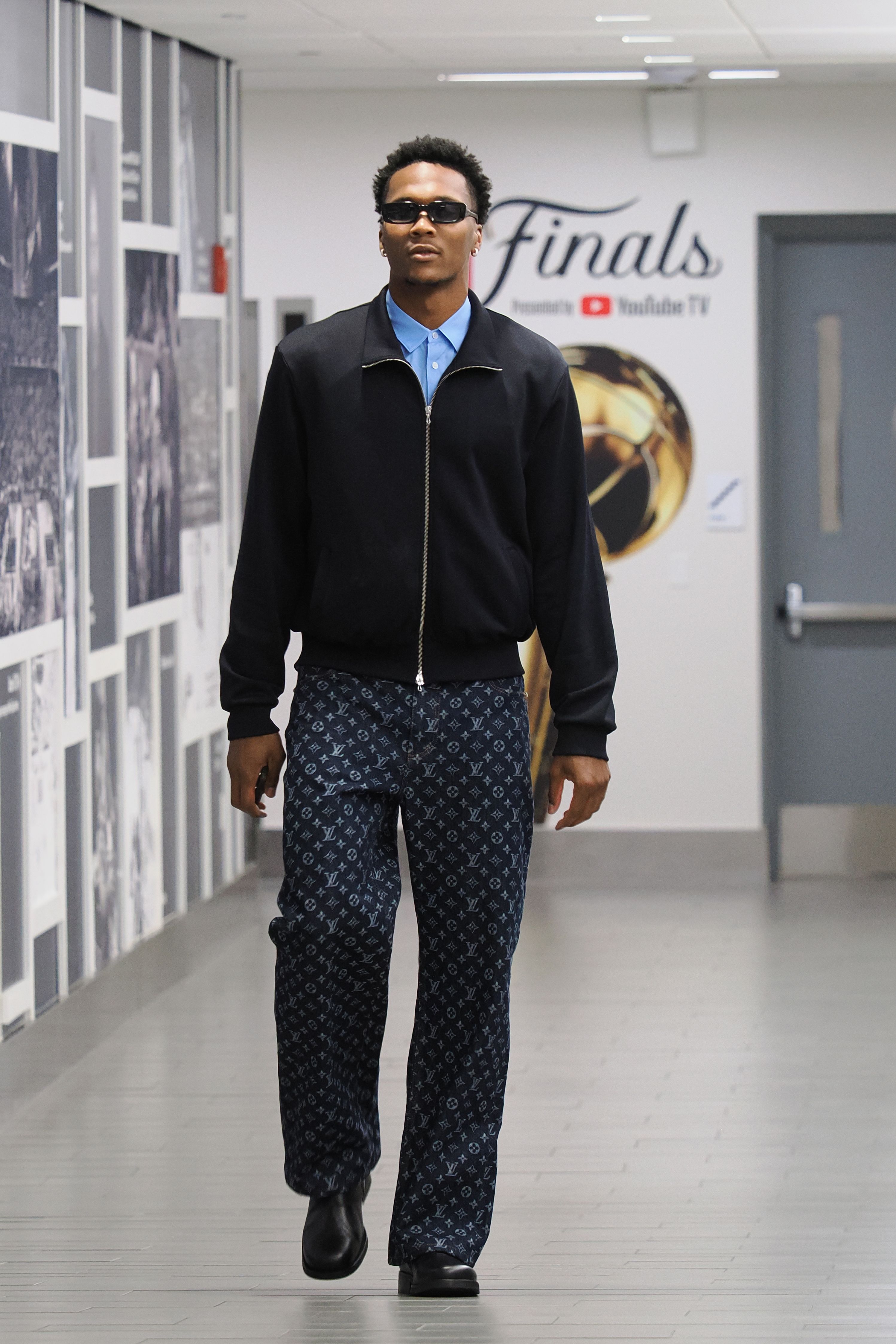 A man in a jacket and jeans