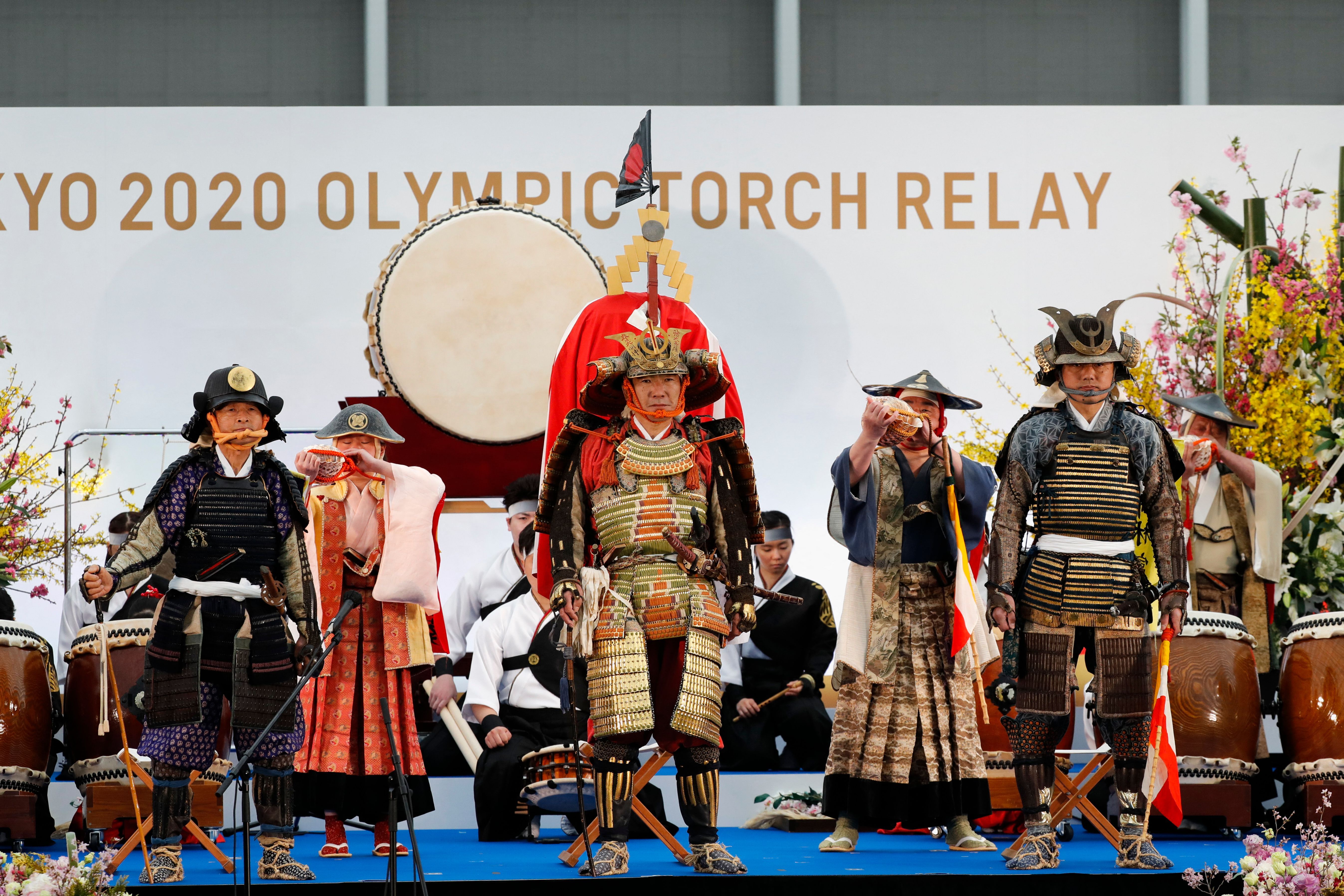 Members of Shinehago Equestrian Association perform during an opening ceremony on the first day of the Tokyo 2020 Olympic torch relay in Naraha, Fukushima