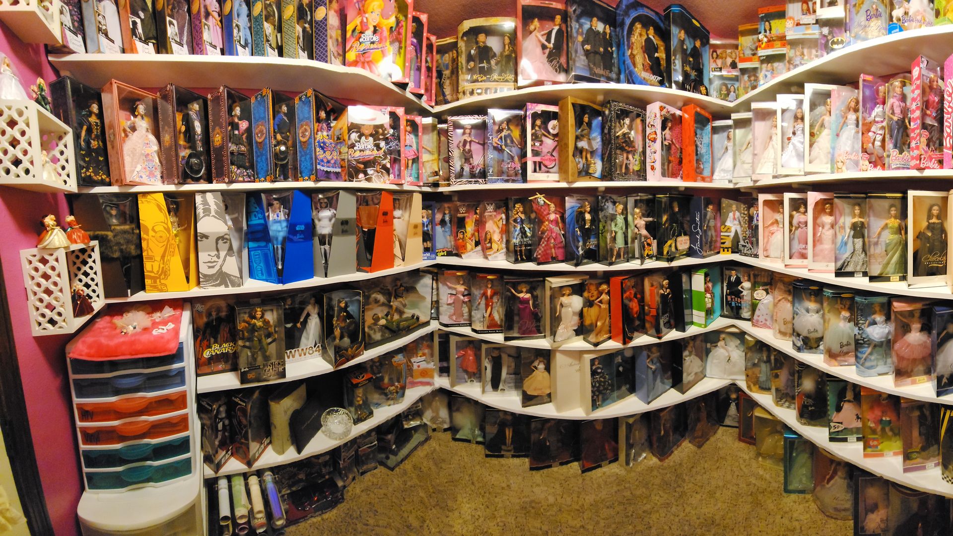 A photo of a Barbie doll collection.