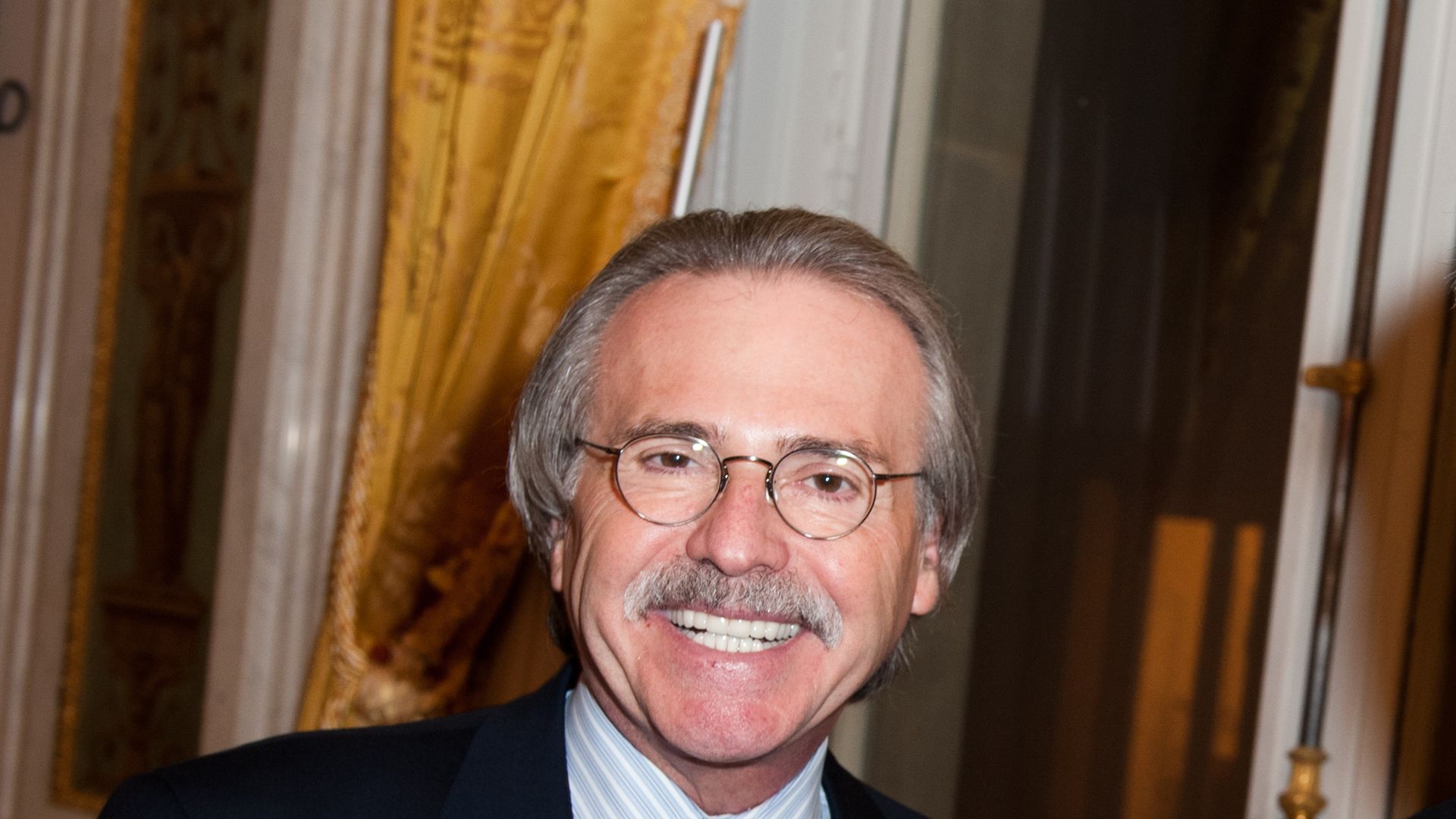 David Pecker smiles