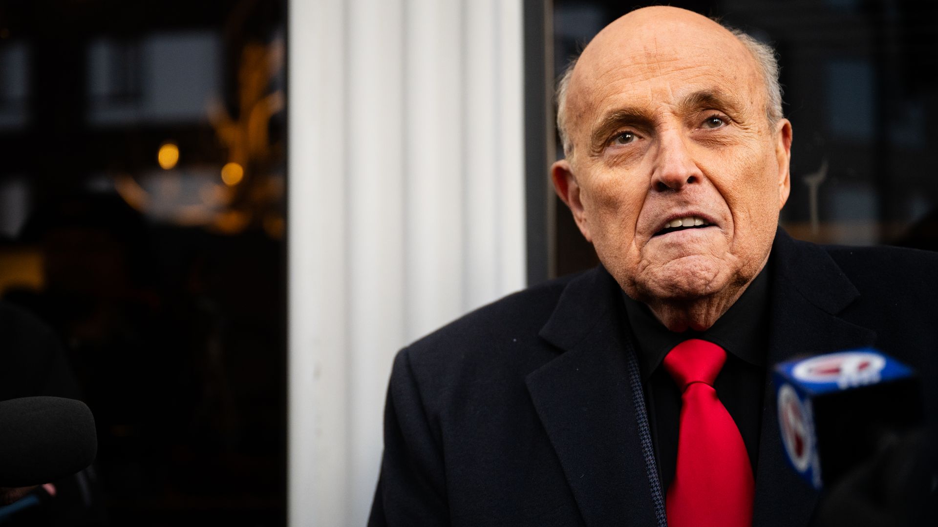 Rudy Giuliani speaks to members of the media  on January 21, 2024 in Manchester, New Hampshire.