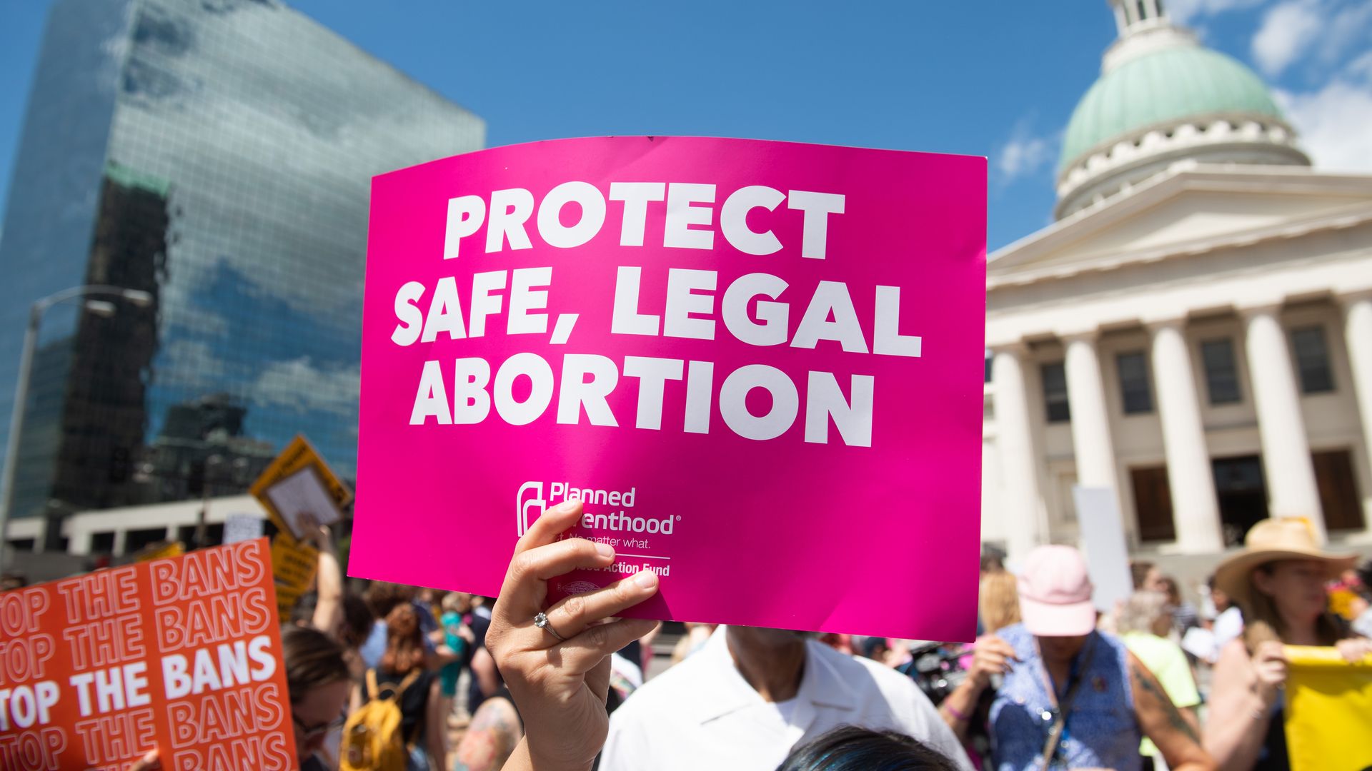 Protestor holding sign for abortions
