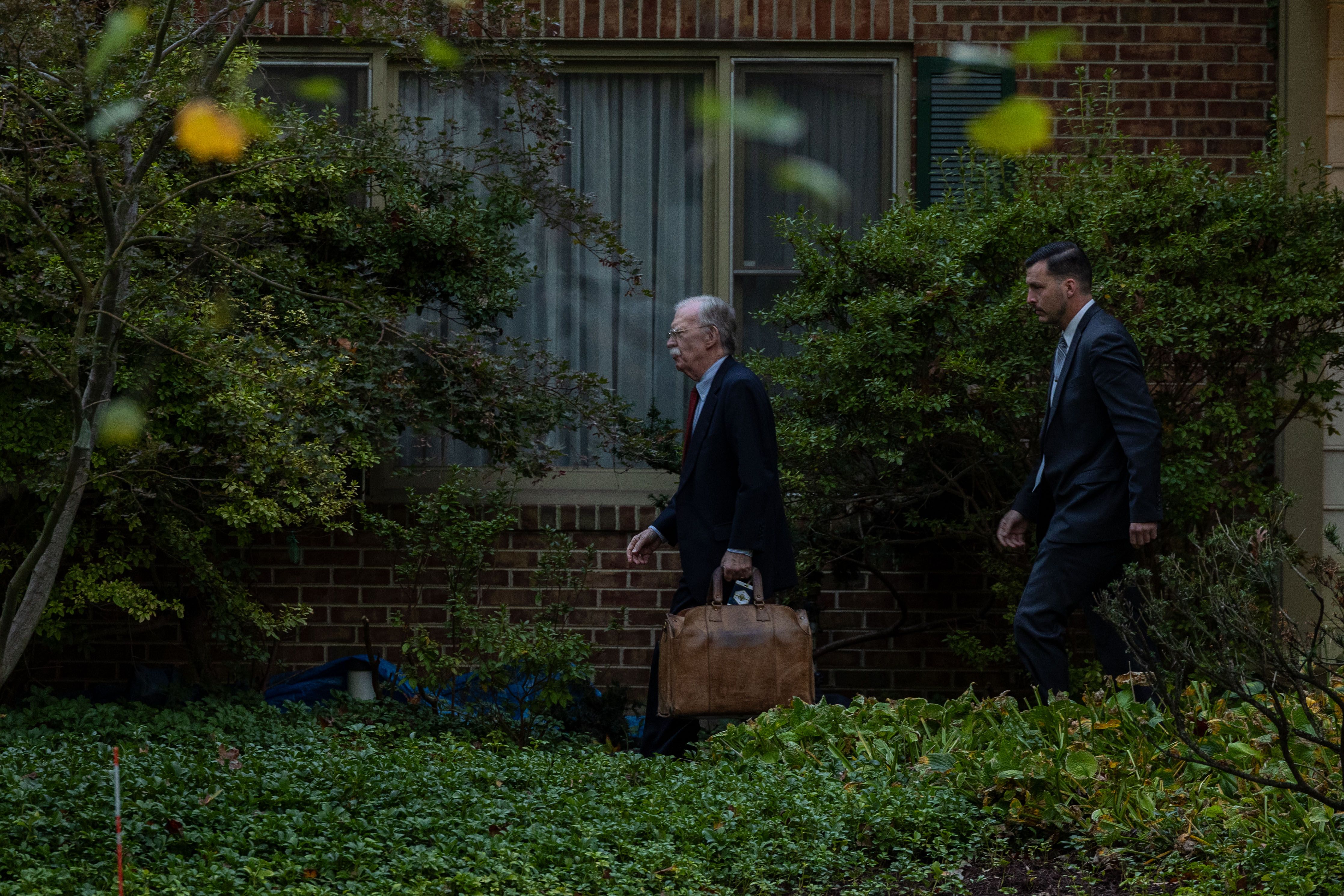 BETHESDA, MARYLAND - OCTOBER 17: John Bolton leaves his home on October 17, 2025 in Bethesda, Maryland. Former national security adviser Bolton was indicted by a federal grand jury on Thursday. (Photo by Alex Kent/Getty Images)
