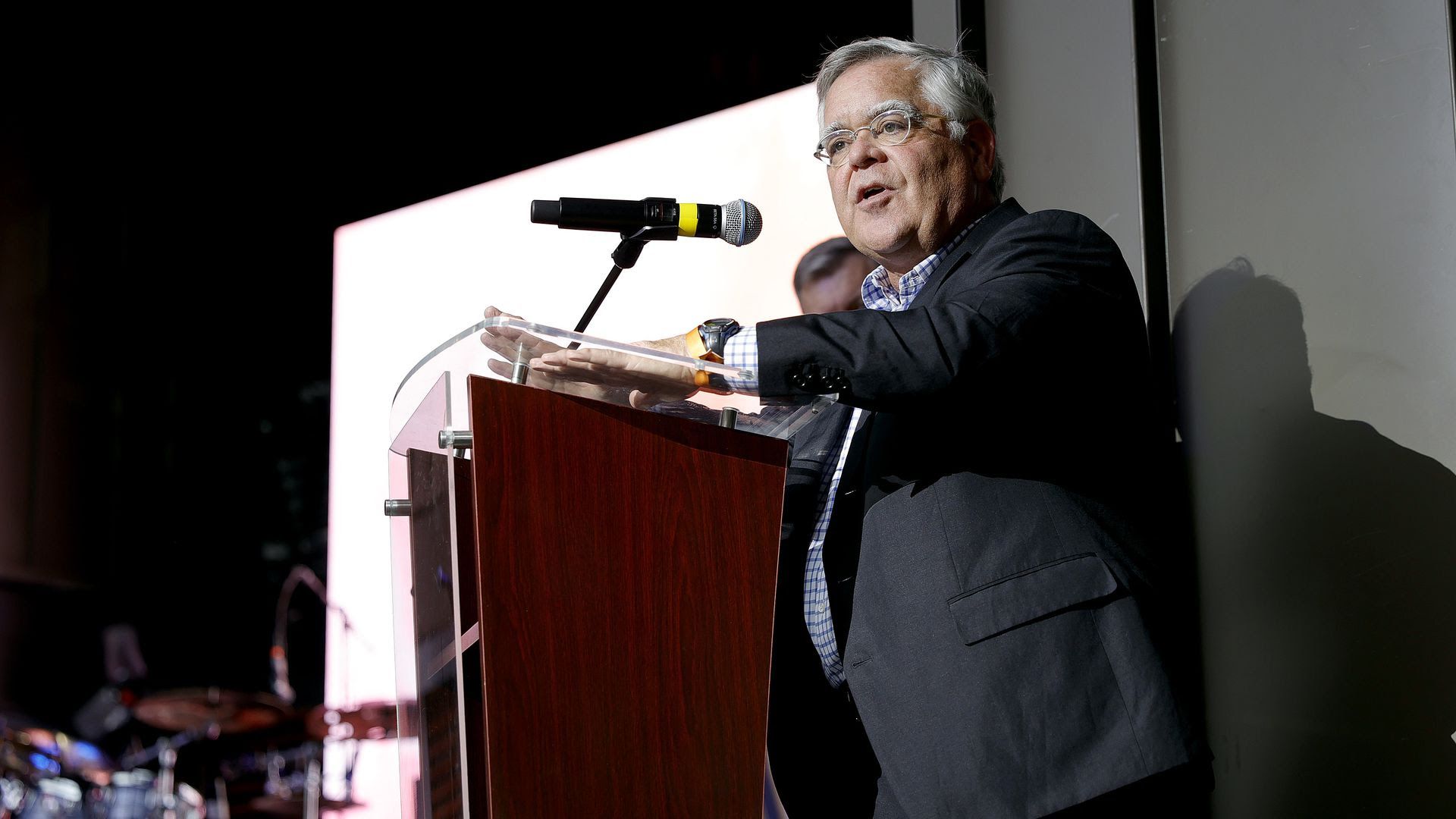 Nashville Mayor John Cooper speaks on a podium.