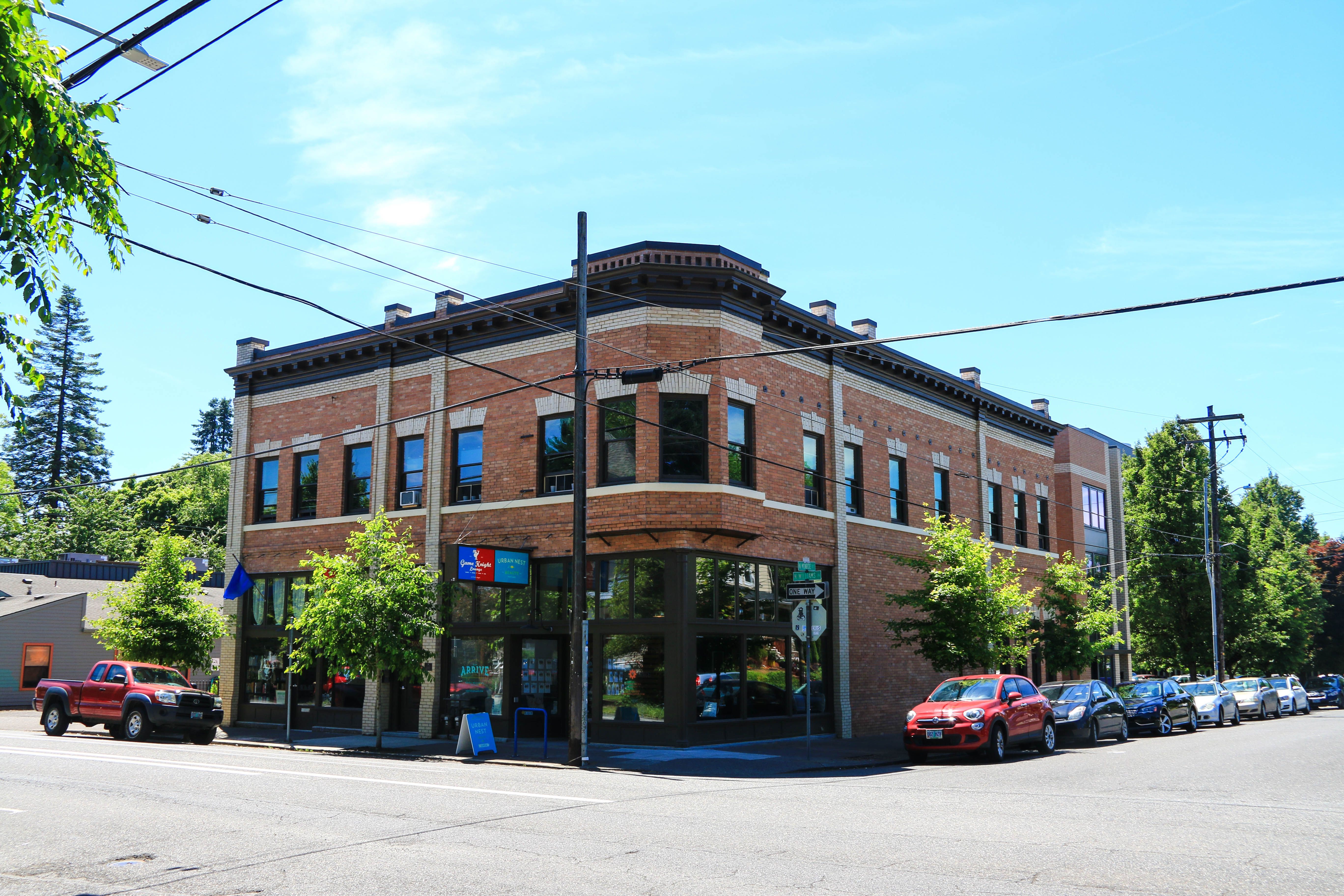 The exterior of a brick three-story building.
