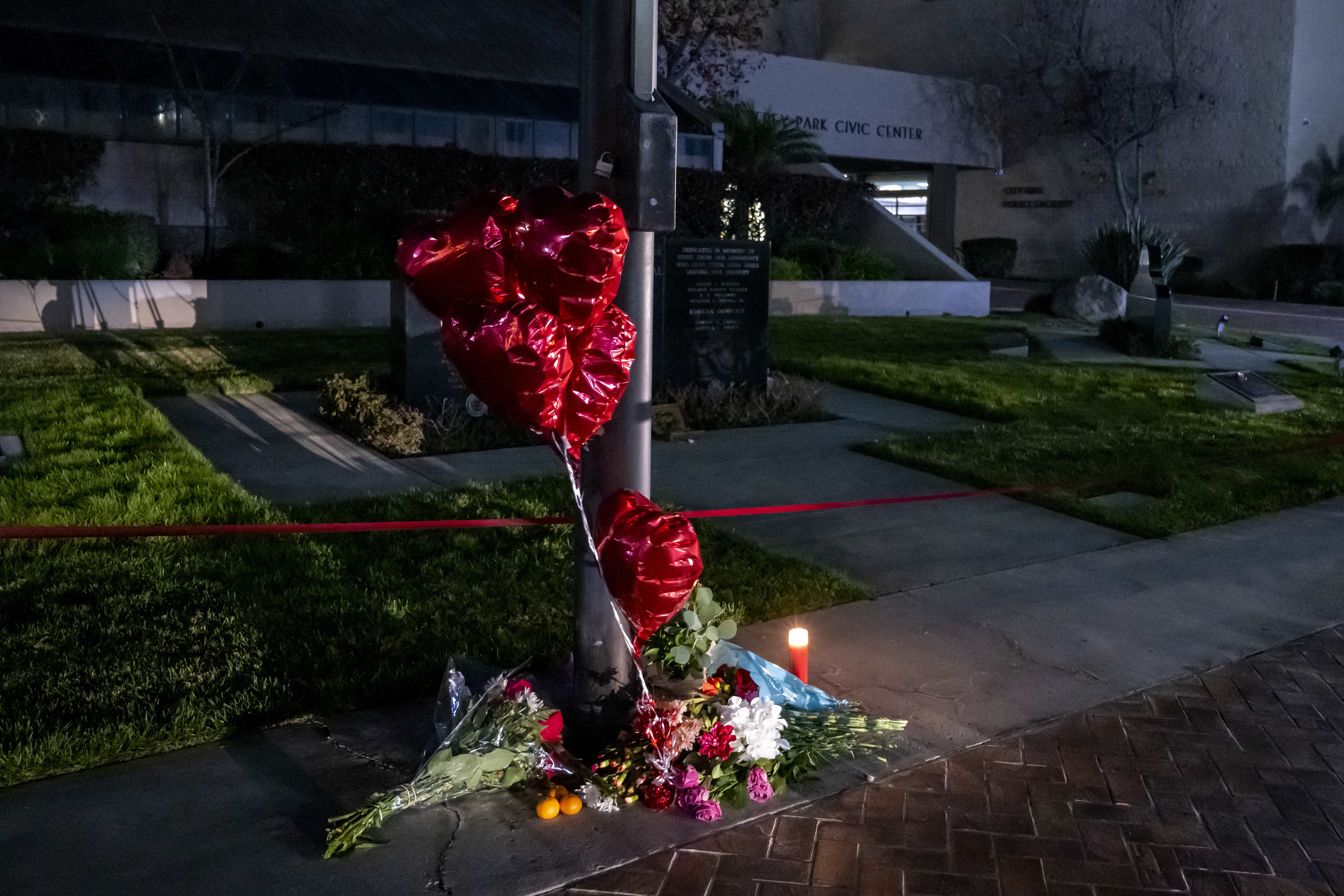 A memorial is building at City Hall in Monterey Park on Sunday, January 22.