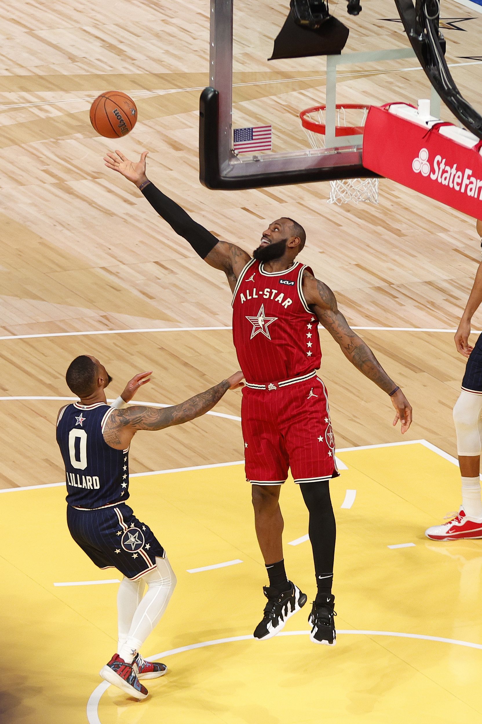: LeBron James #23 of the Western Conference reaches for a rebound during the NBA All-Star Game as part of NBA All-Star Weekend on Sunday, February 18, 2024 at Gainbridge Fieldhouse in Indianapolis.