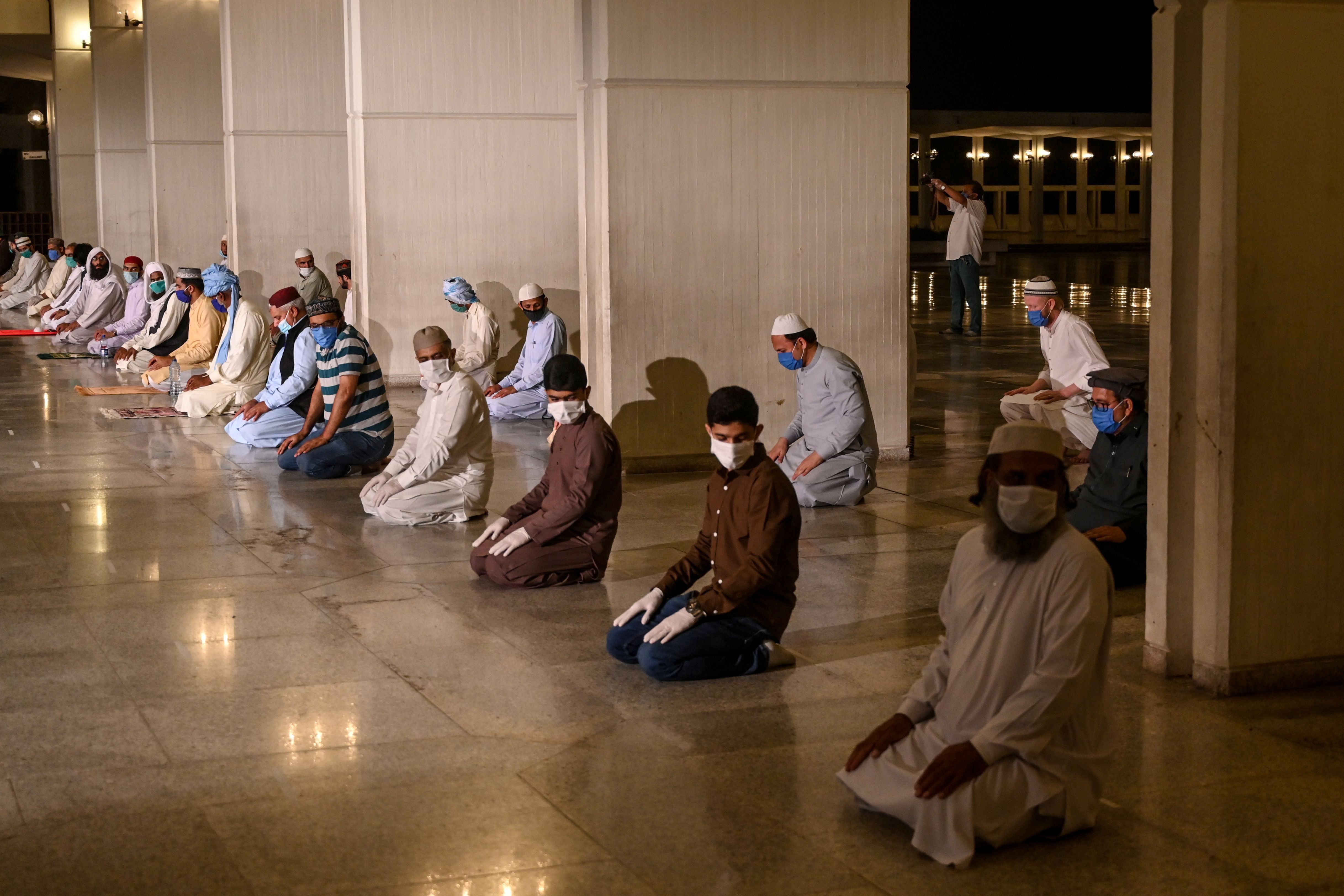 Muslims praying while practicing social distancing in Pakistan