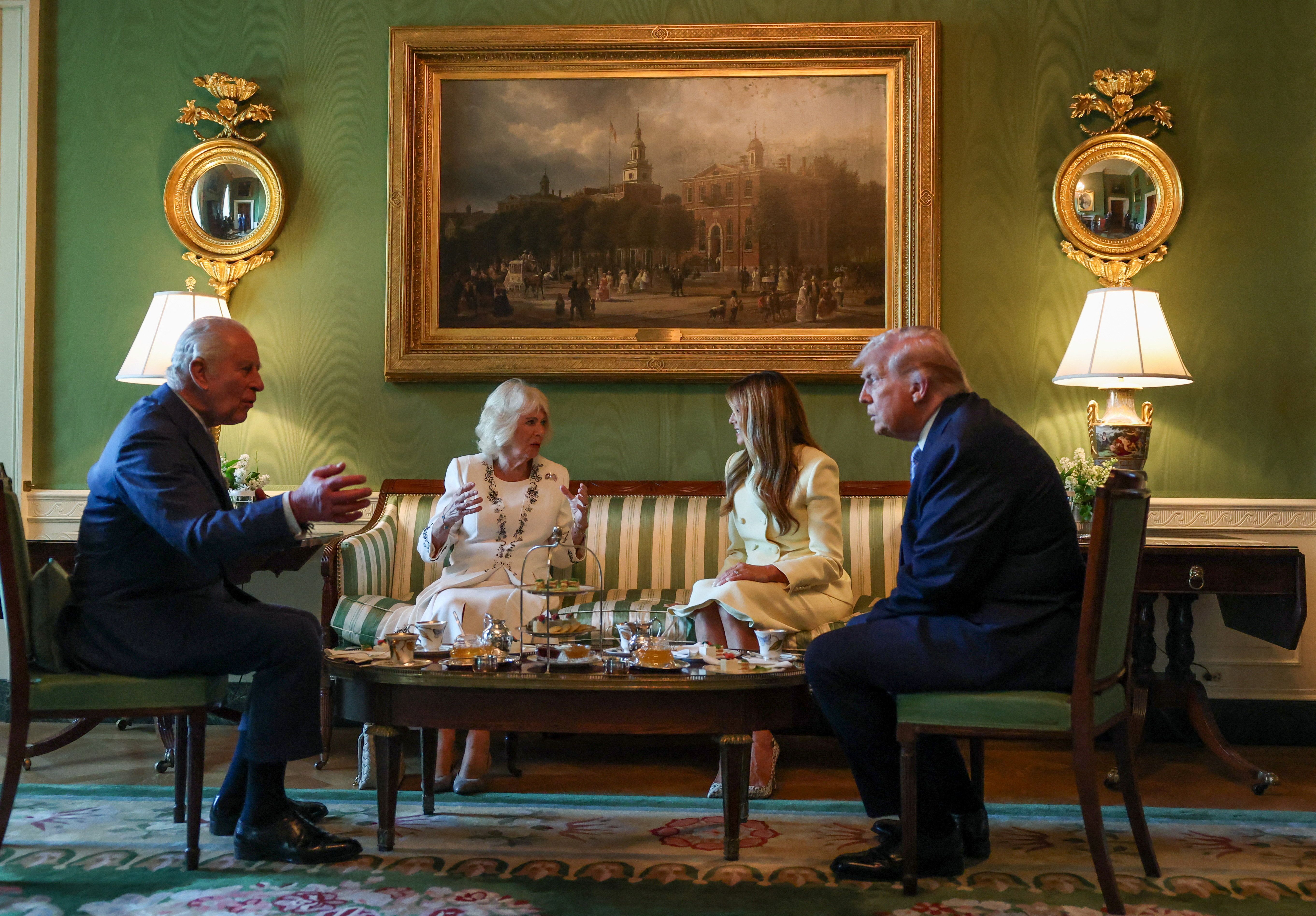 President Trump and First Lady Melania Trump host King Charles III and Queen Camilla for afternoon tea in the White House Green Room yesterday.